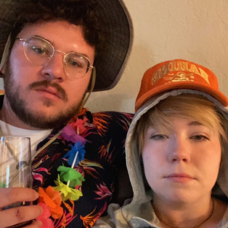 Justin Bieber and a tourist waiting for trick-or-treaters.