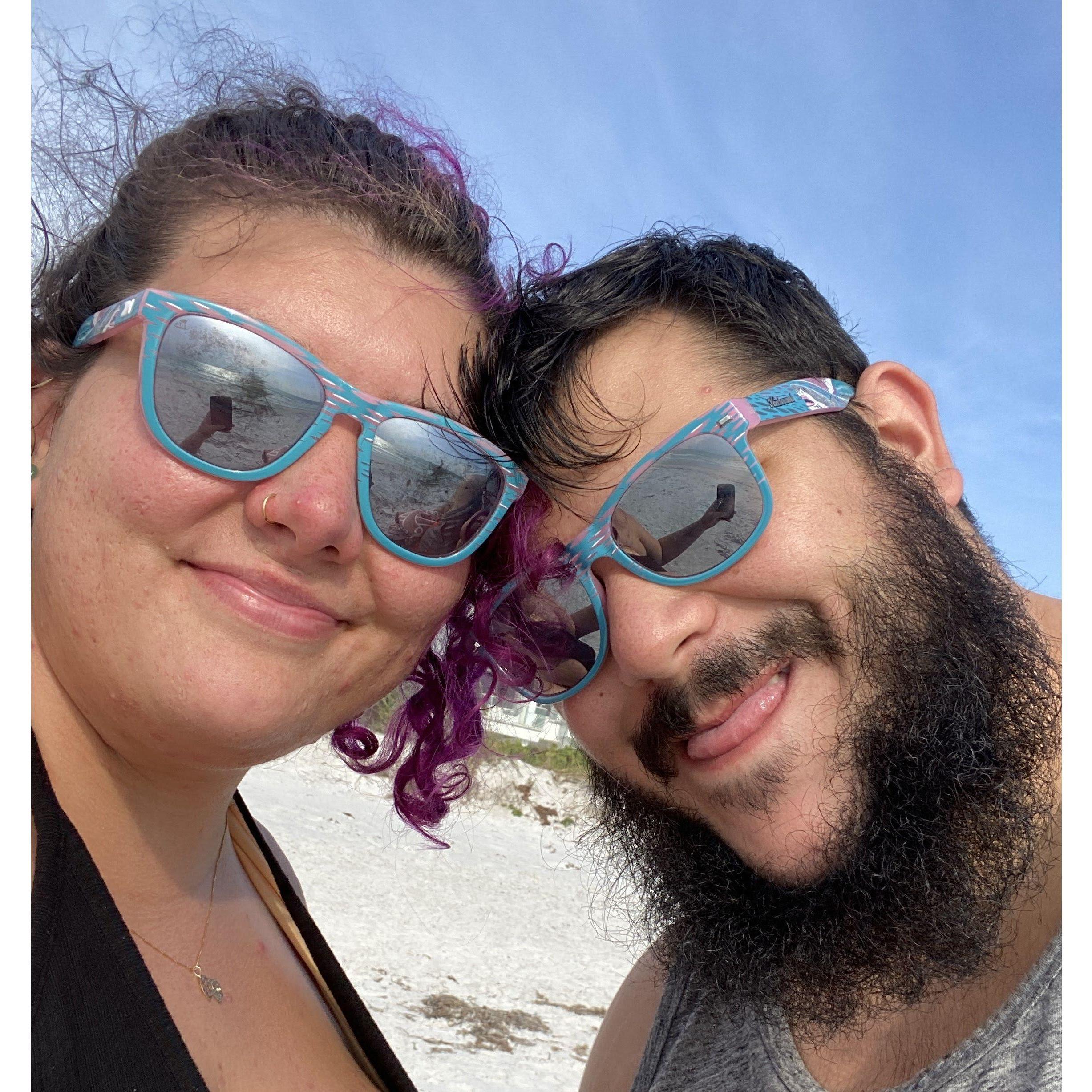 We sported our new matching sunglasses at the beach. Summer 2024