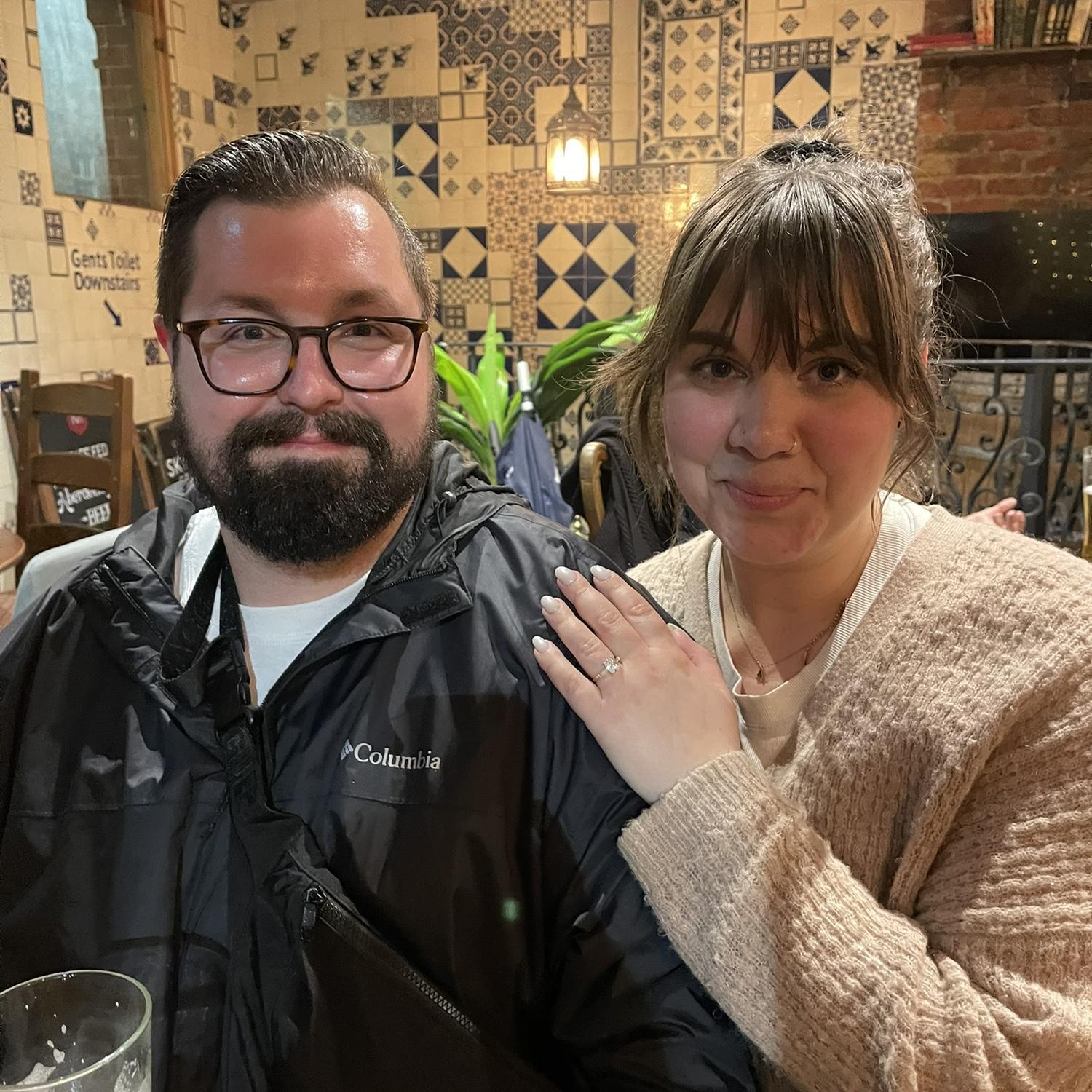 Right after we got engaged! Celebrating in a pub in London.