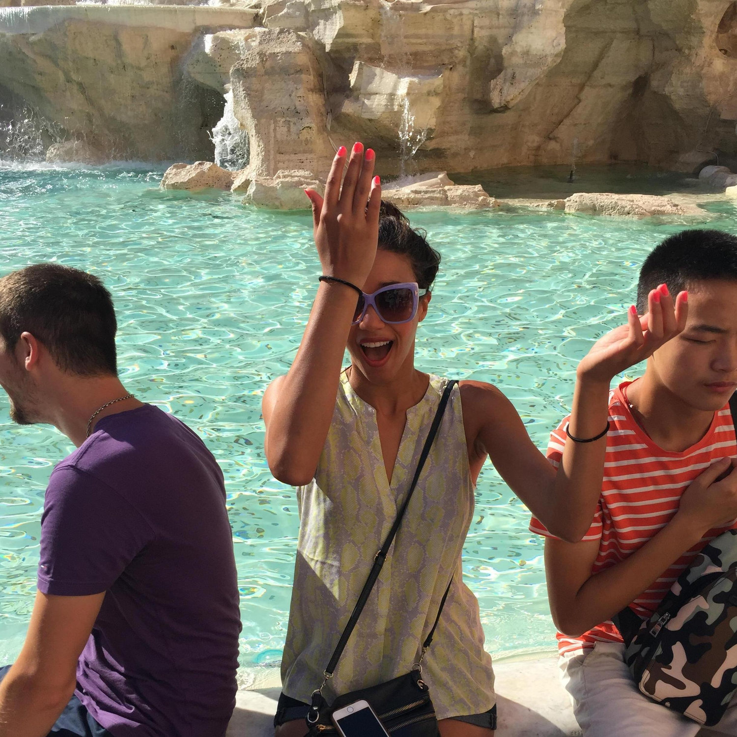 Alex making a wish at the Trevi Fountain