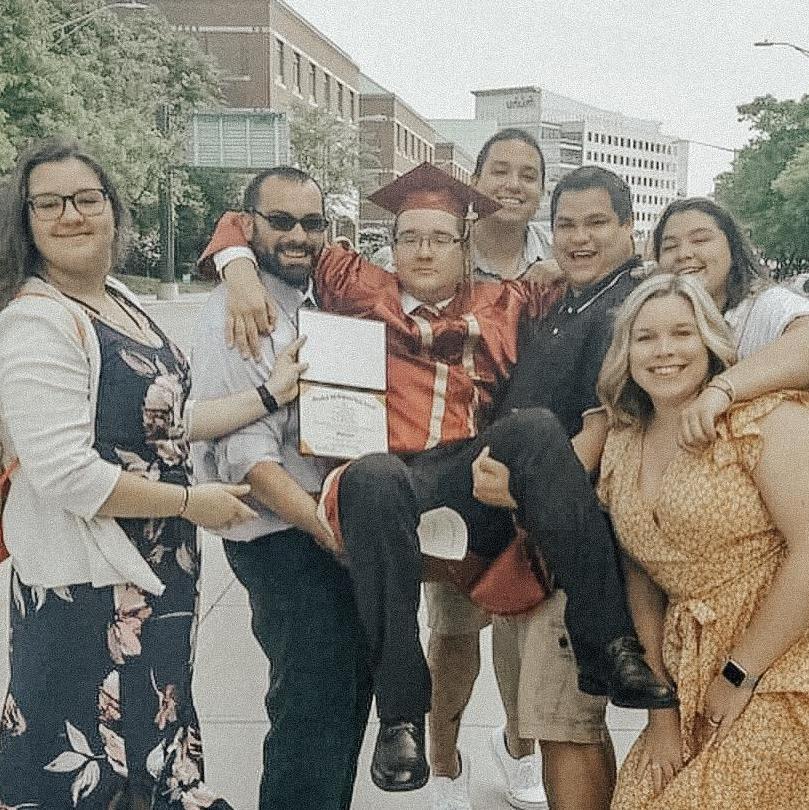Kayla's cousins and brothers celebrating Kevin's high school graduation