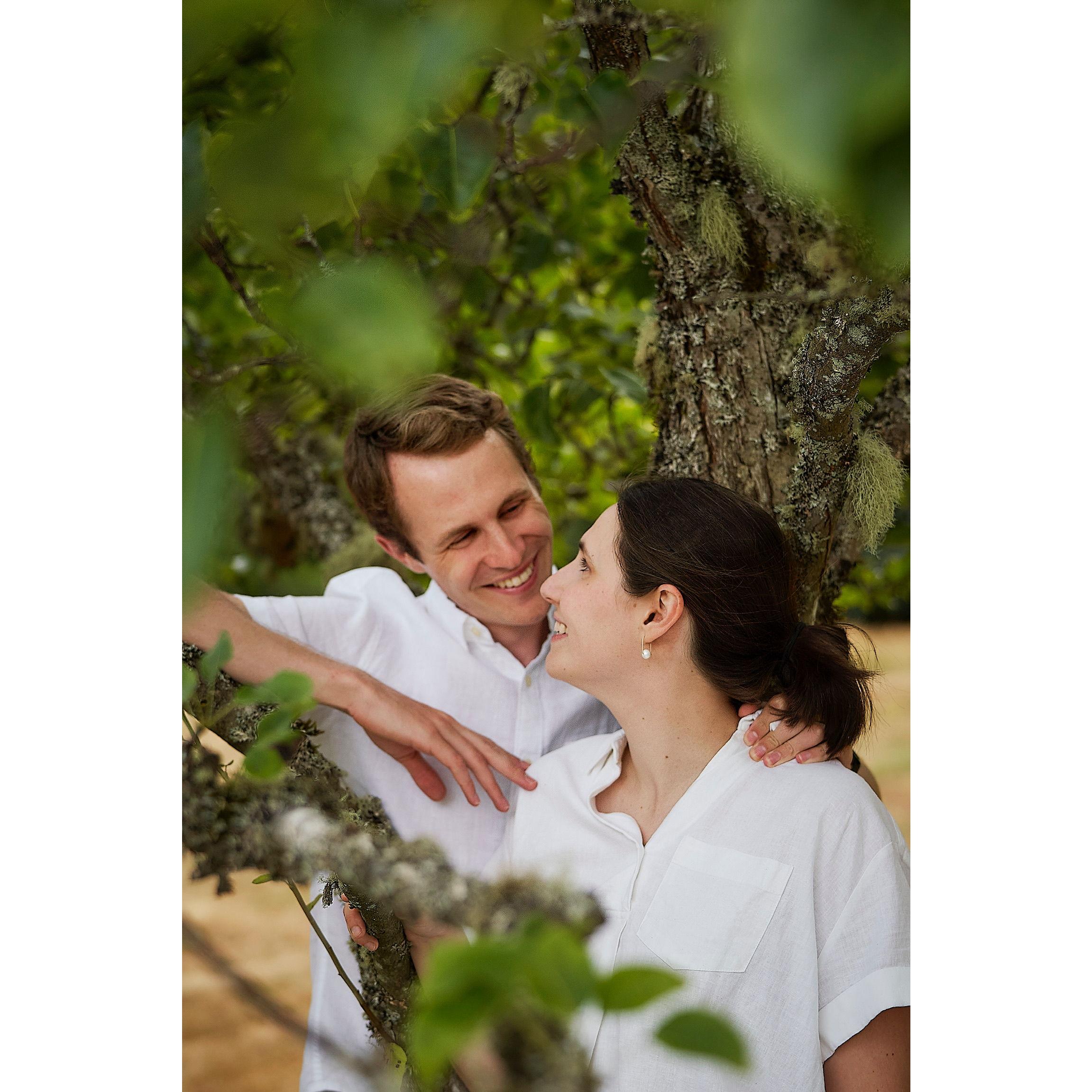 Engagement photos in the backyard apple orchard on Bainbridge Island (2022)