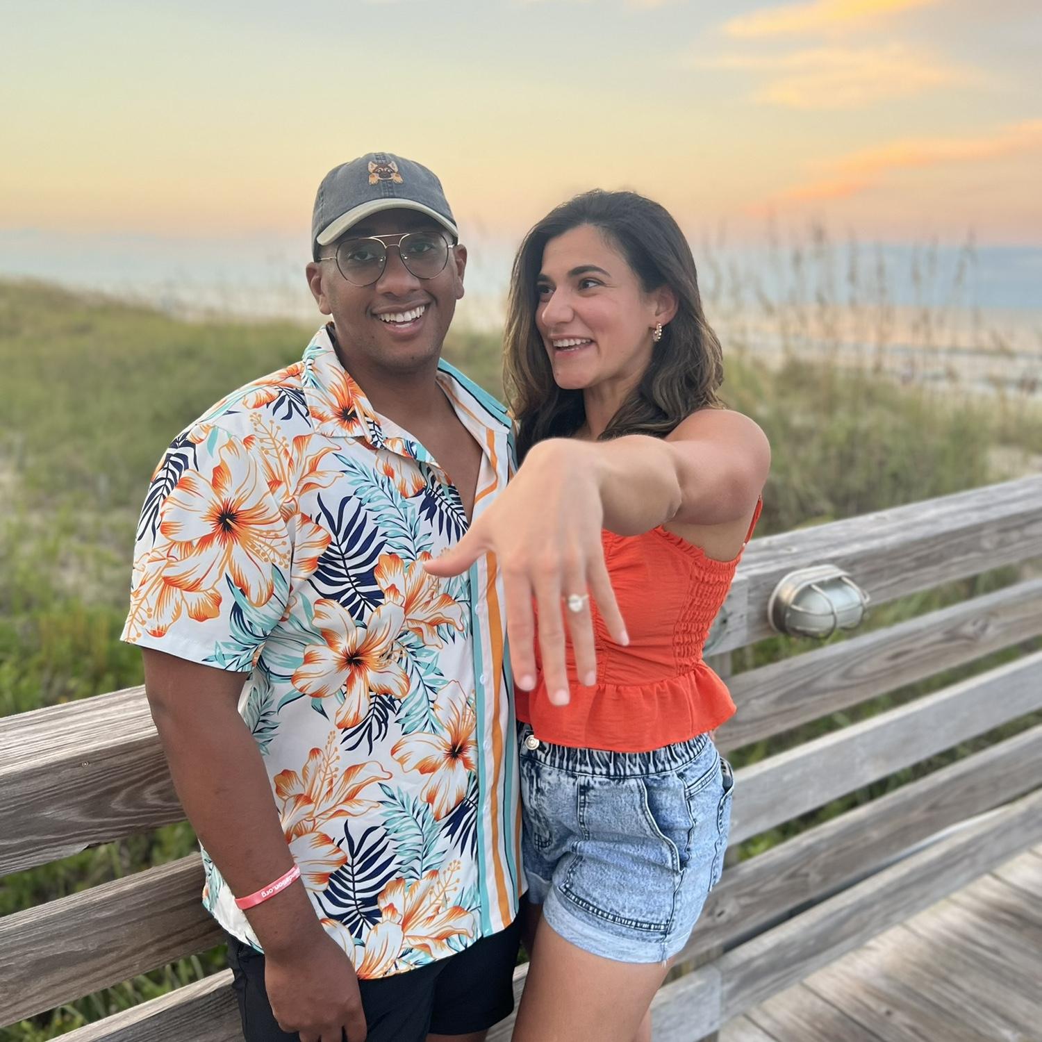Erica, clearly still in shock, and Branden celebrating with dinner at the beach with our families.