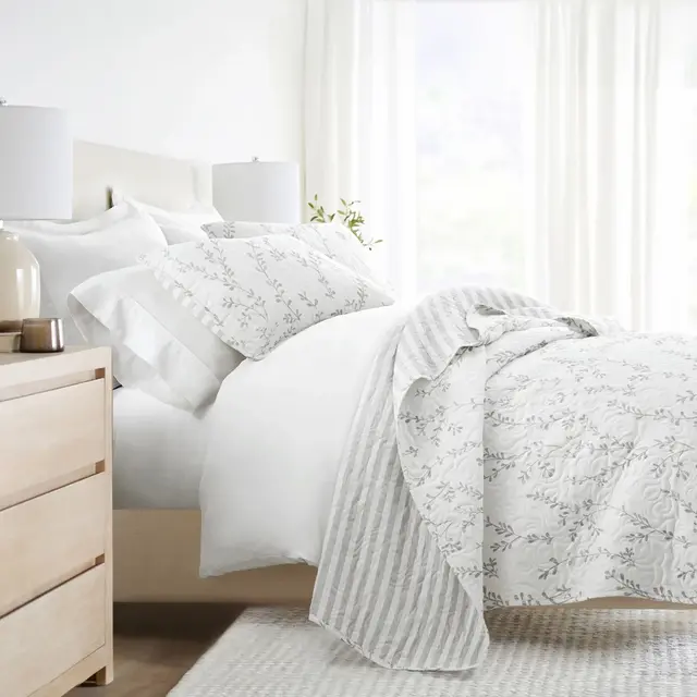 Geometric and Floral Modern Reversible Quilt and Shams Set - Becky Cameron, Sprouting Vines Stripe / Light Gray, King/California King