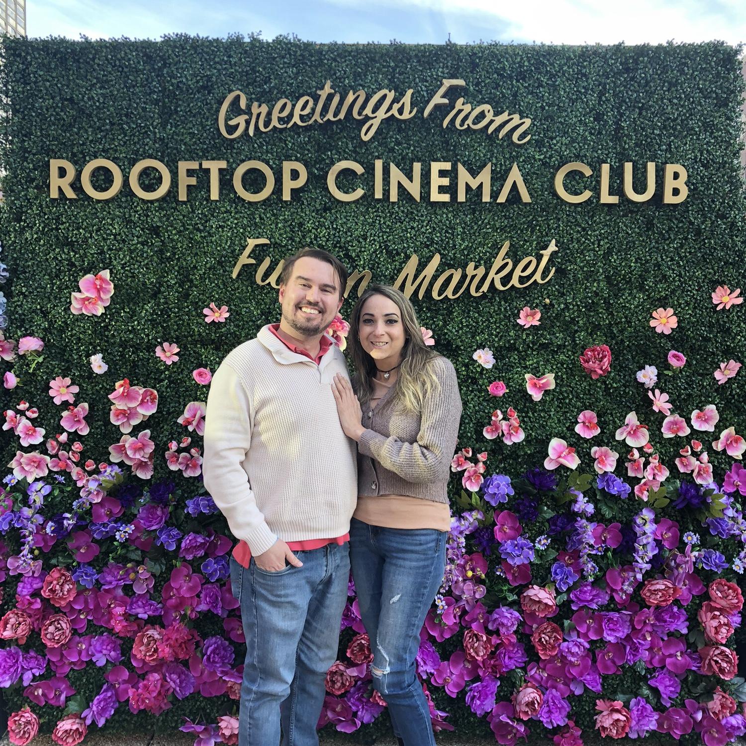 Sometimes, Jon plans surprise date nights for Sarah. This night was a rooftop movie in downtown near Fulton Market.
