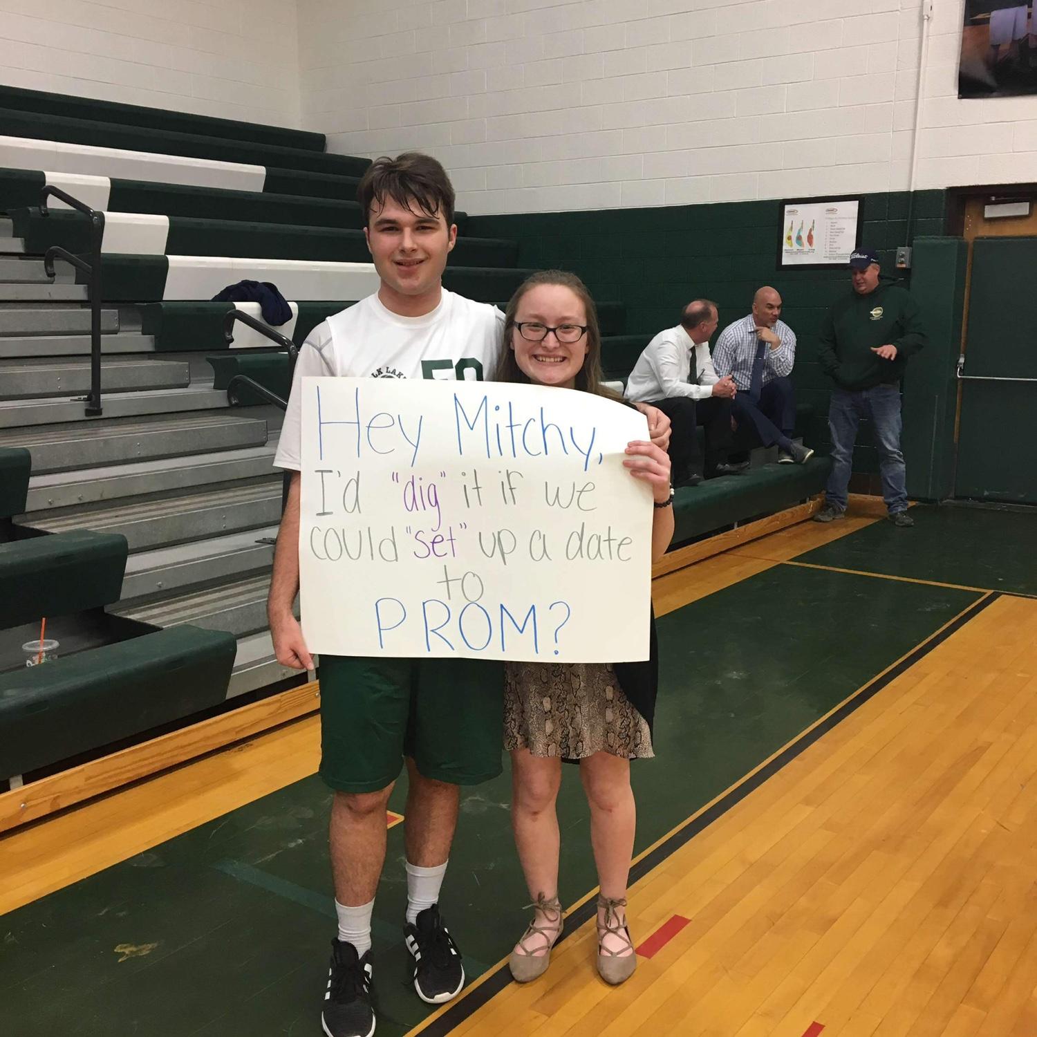 Asking Mitchell to my first prom at his volleyball game!