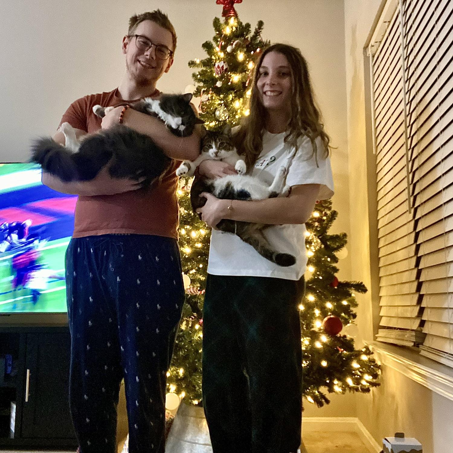 Family photo in our first home for Christmas 2024!