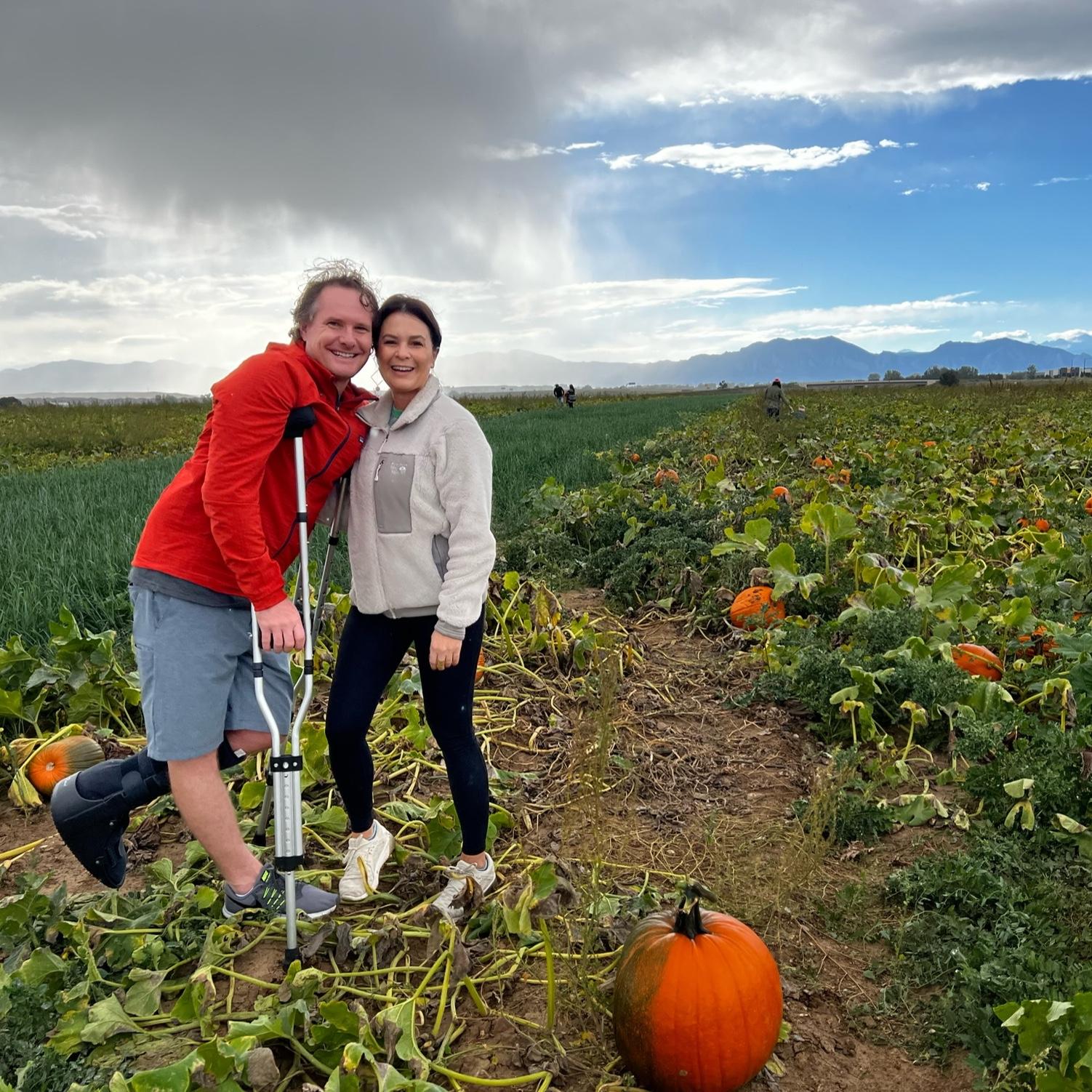 Back in the Denver area, Kim's first time picking pumpkins from a pumpkin patch. This is later the same place where we would get engaged.