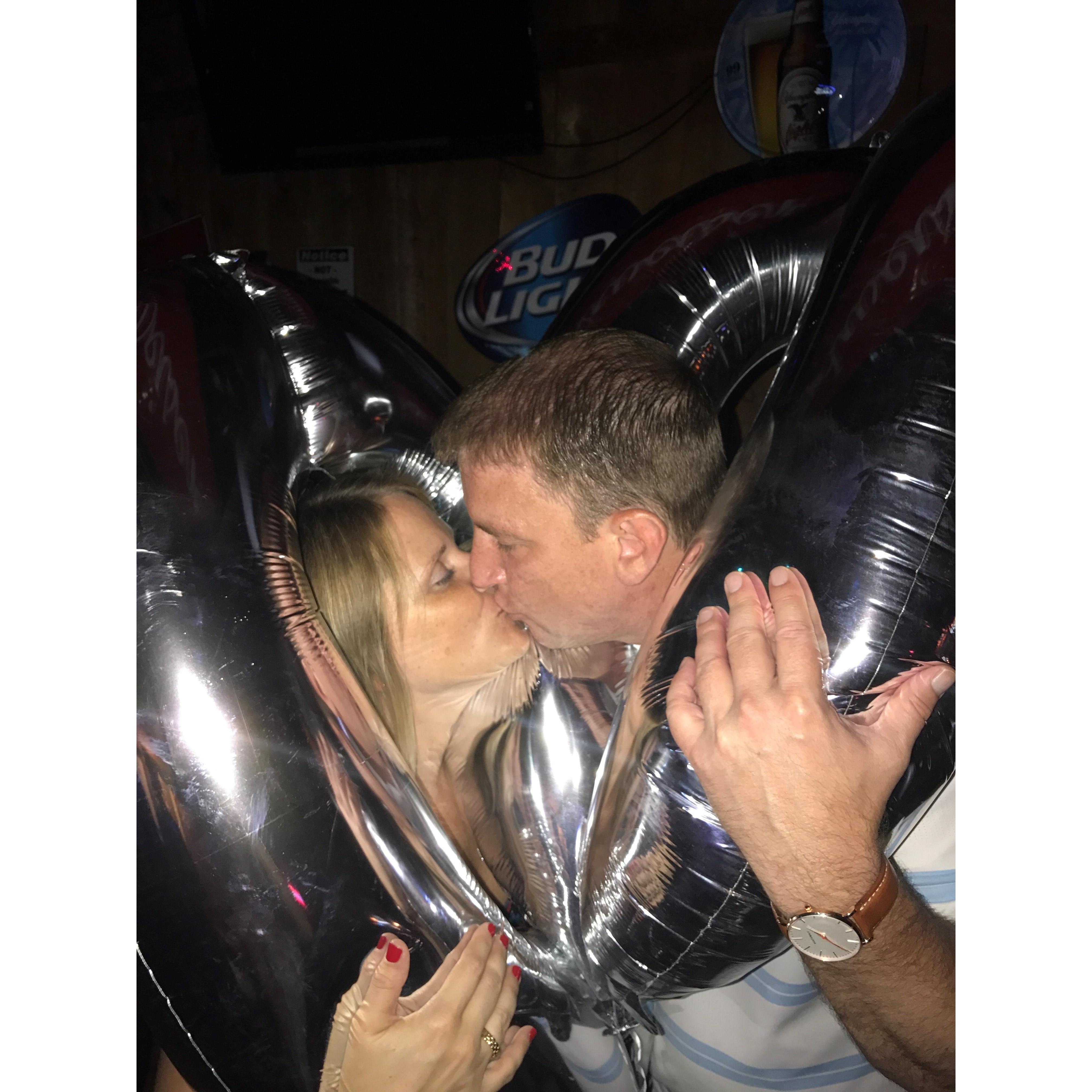 Kissing through balloons!