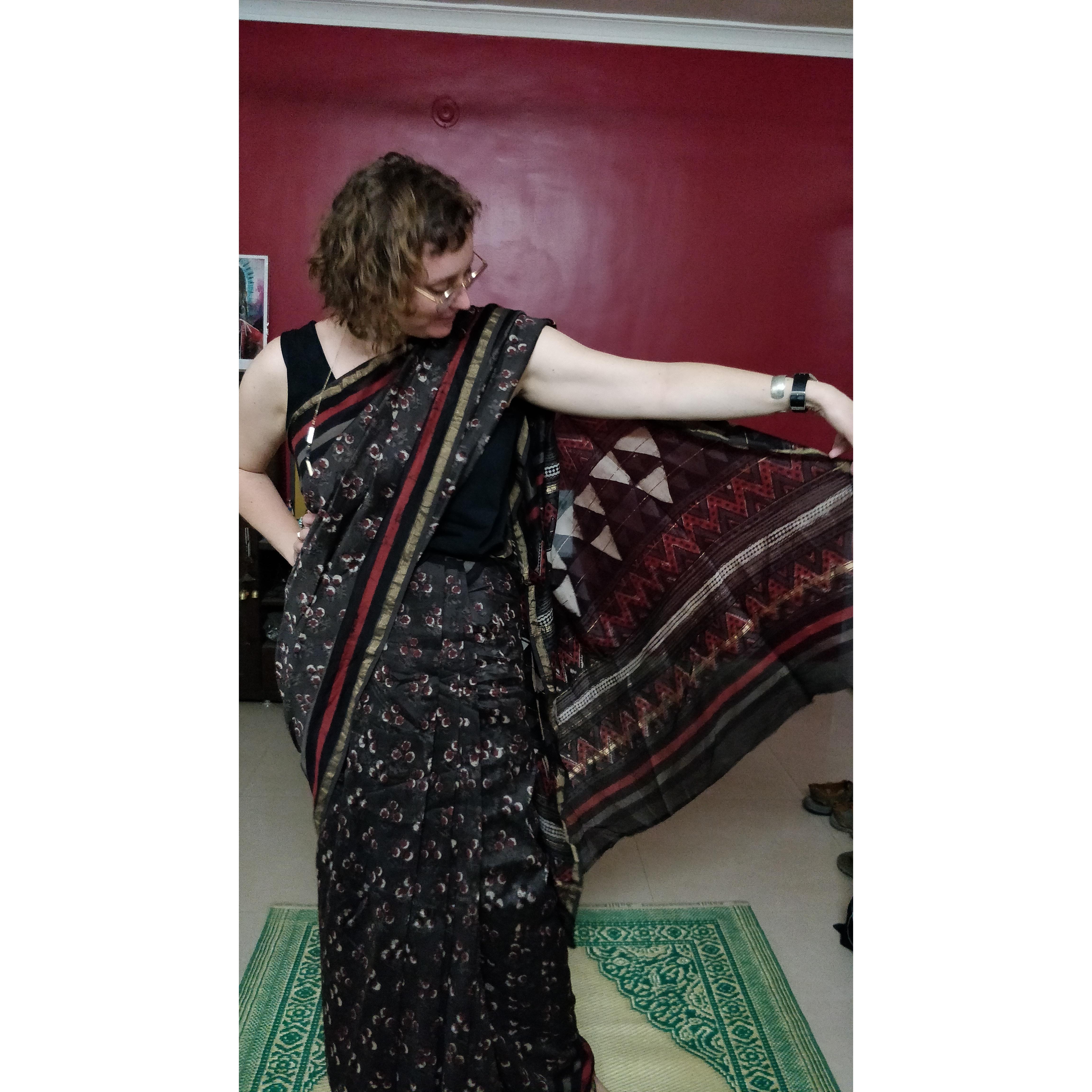 This is a lovely sari from Bangalore. This picture was taken at the very end of a long day..the one time Michaela wore a sari... thanks to much assistance from the skilled ladies..