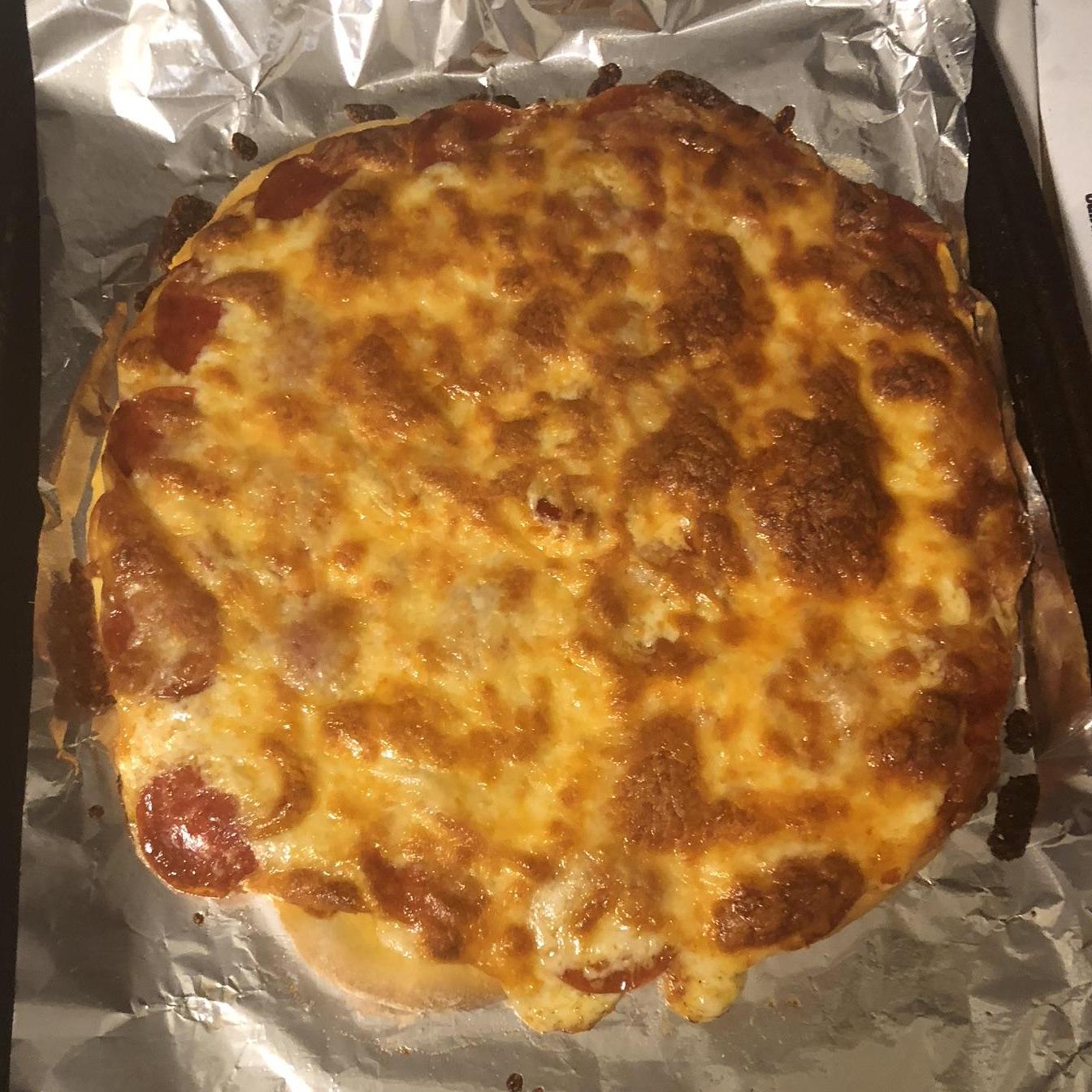 Homemade cheesy pepperoni pizza