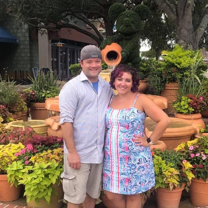 Celebrating our engagement in front of Sylvie's special fountain at Disney Springs, August 2020