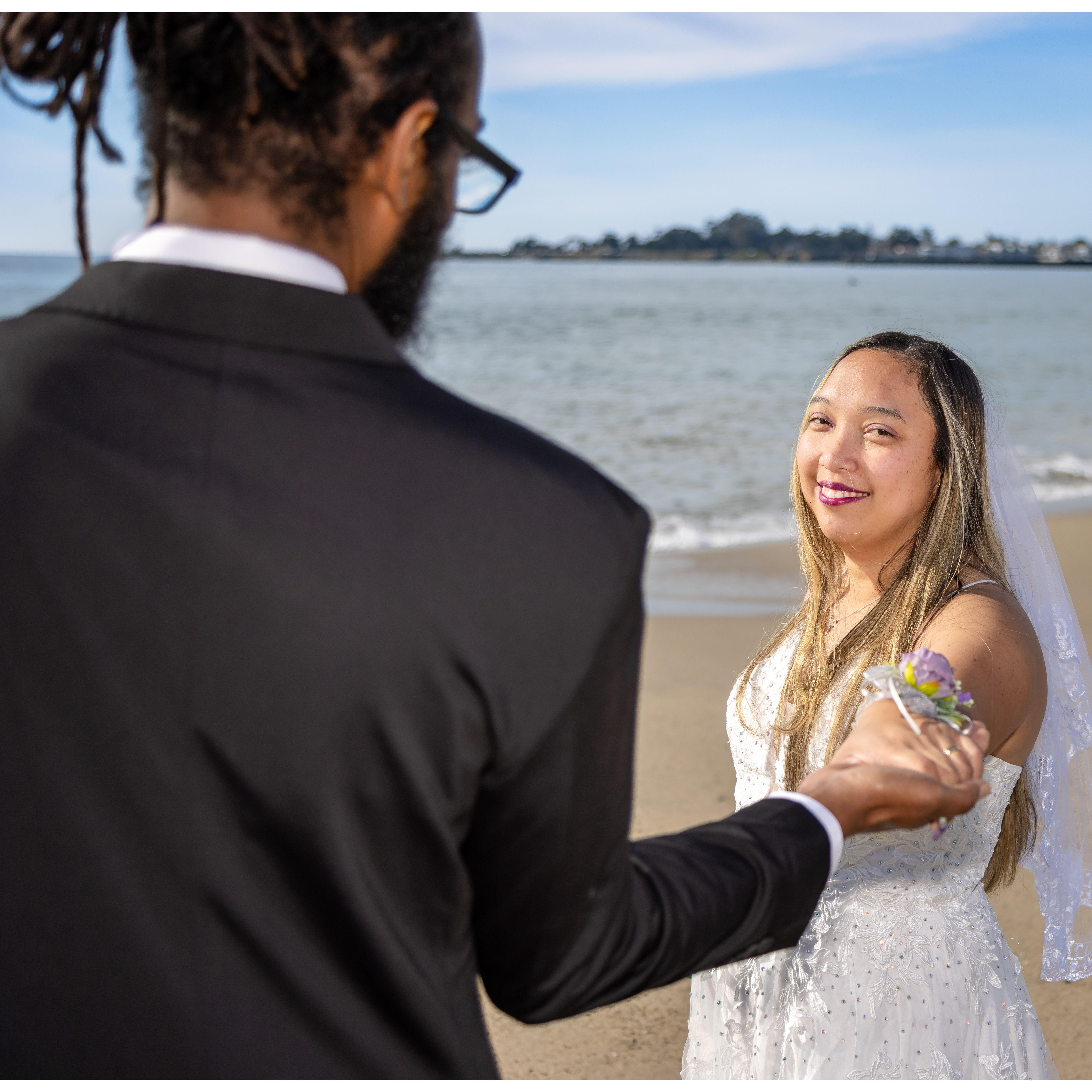 Josh and Apryll sharing a sweet moment on the beach before their big church wedding.