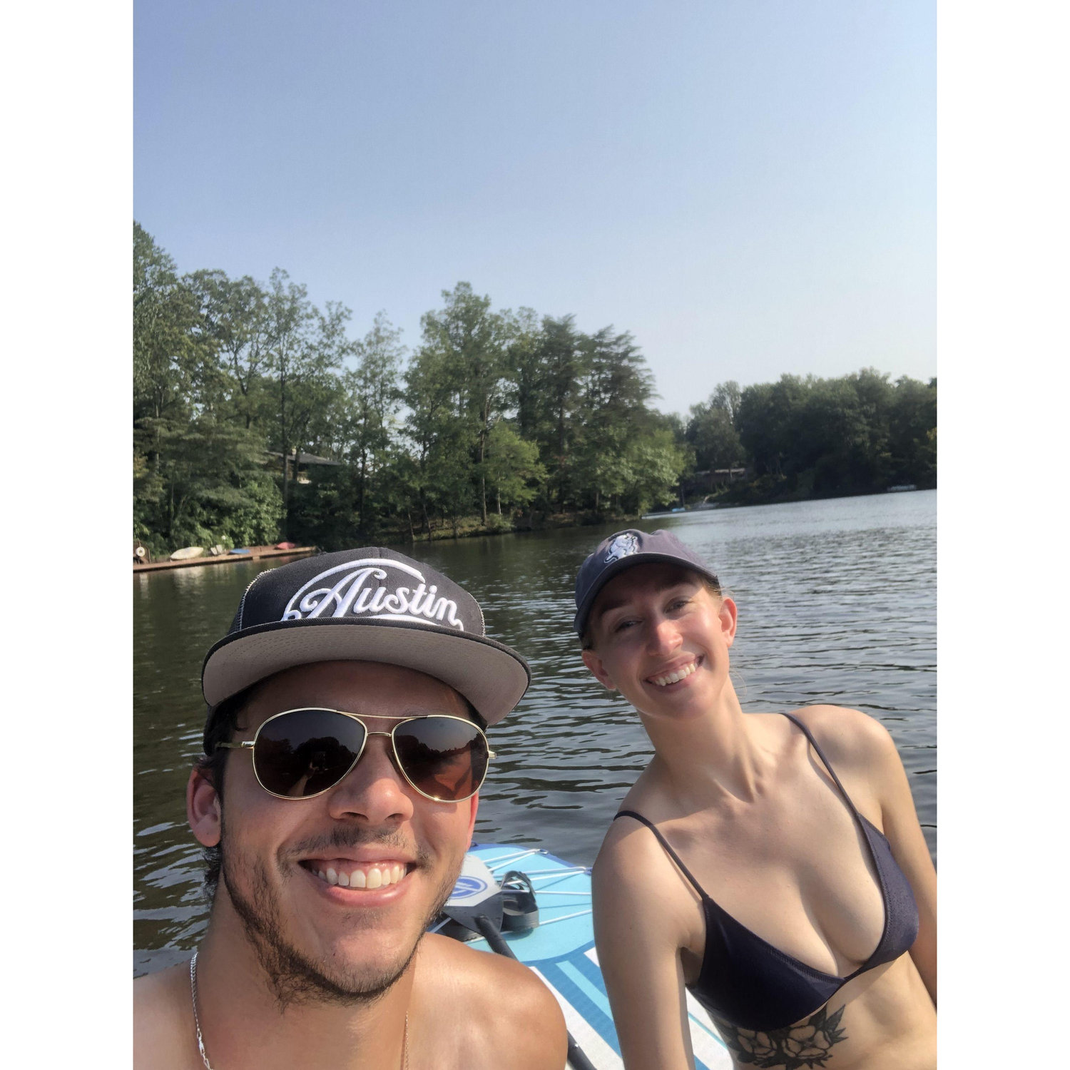 Paddle boarding on the lake.