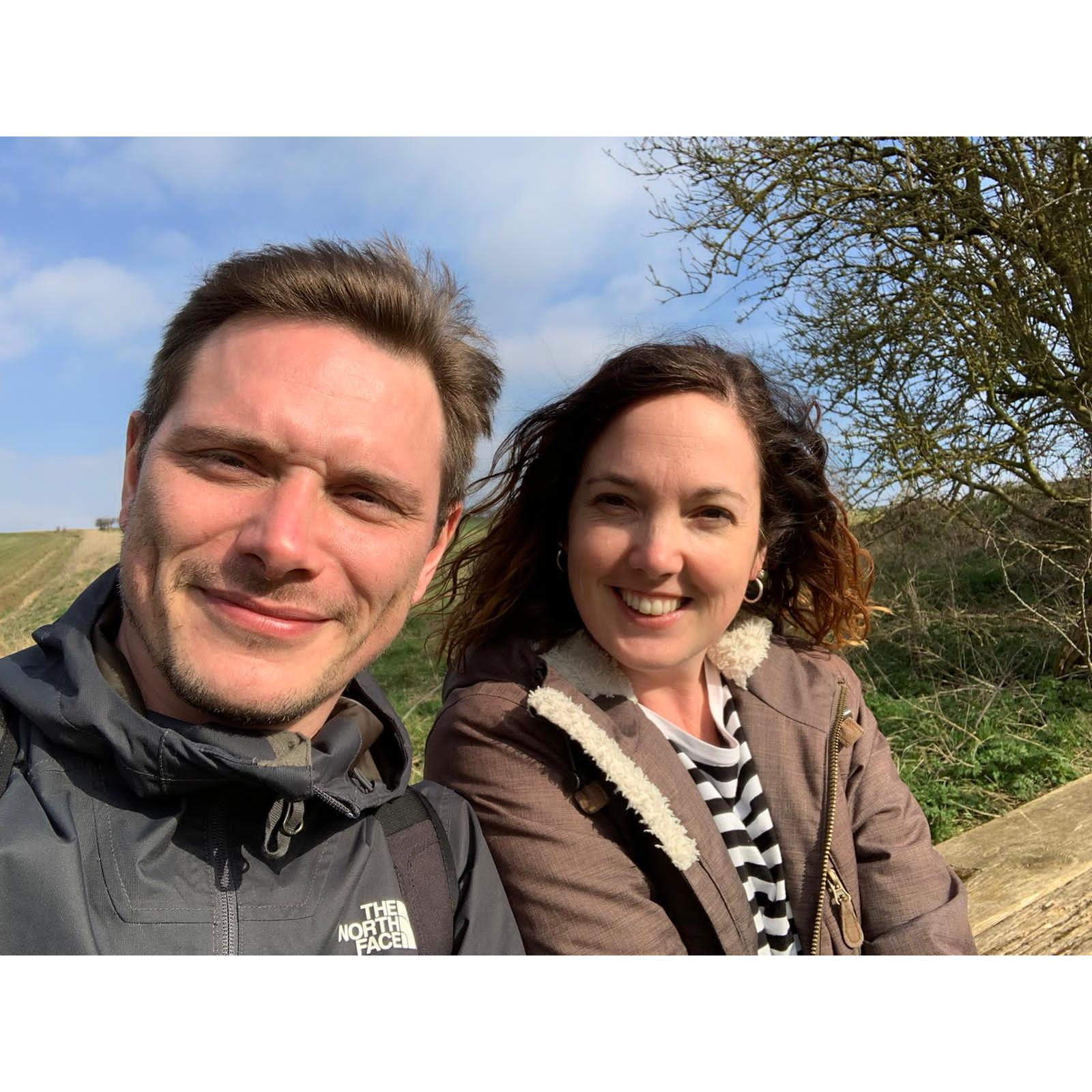 Smiling but scared of the cows in the field behind us!