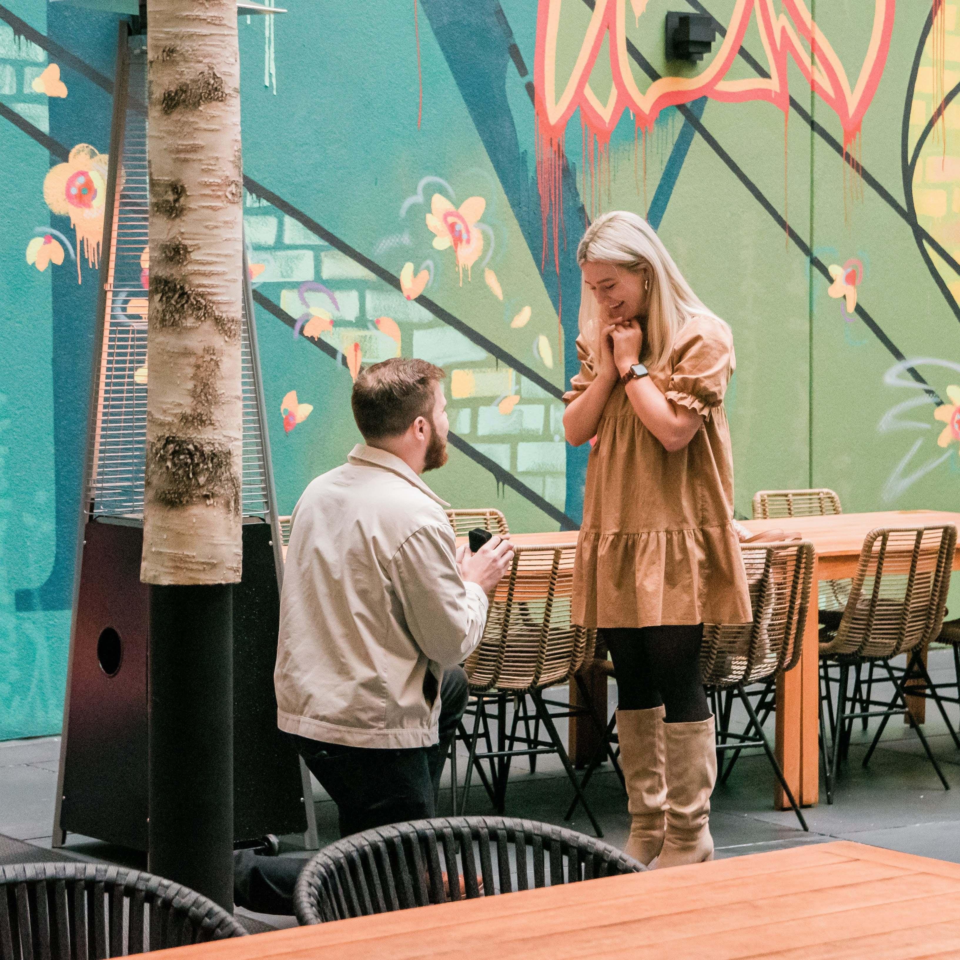 Will popping the question at The Bellyard Hotel's courtyard in West Midtown.