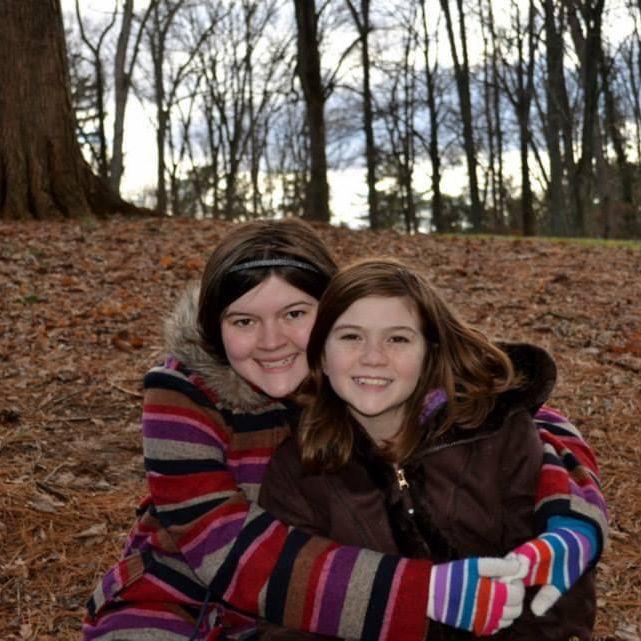 Childhood picture of Kaitlyn with Maid of Honor, Emily Coons