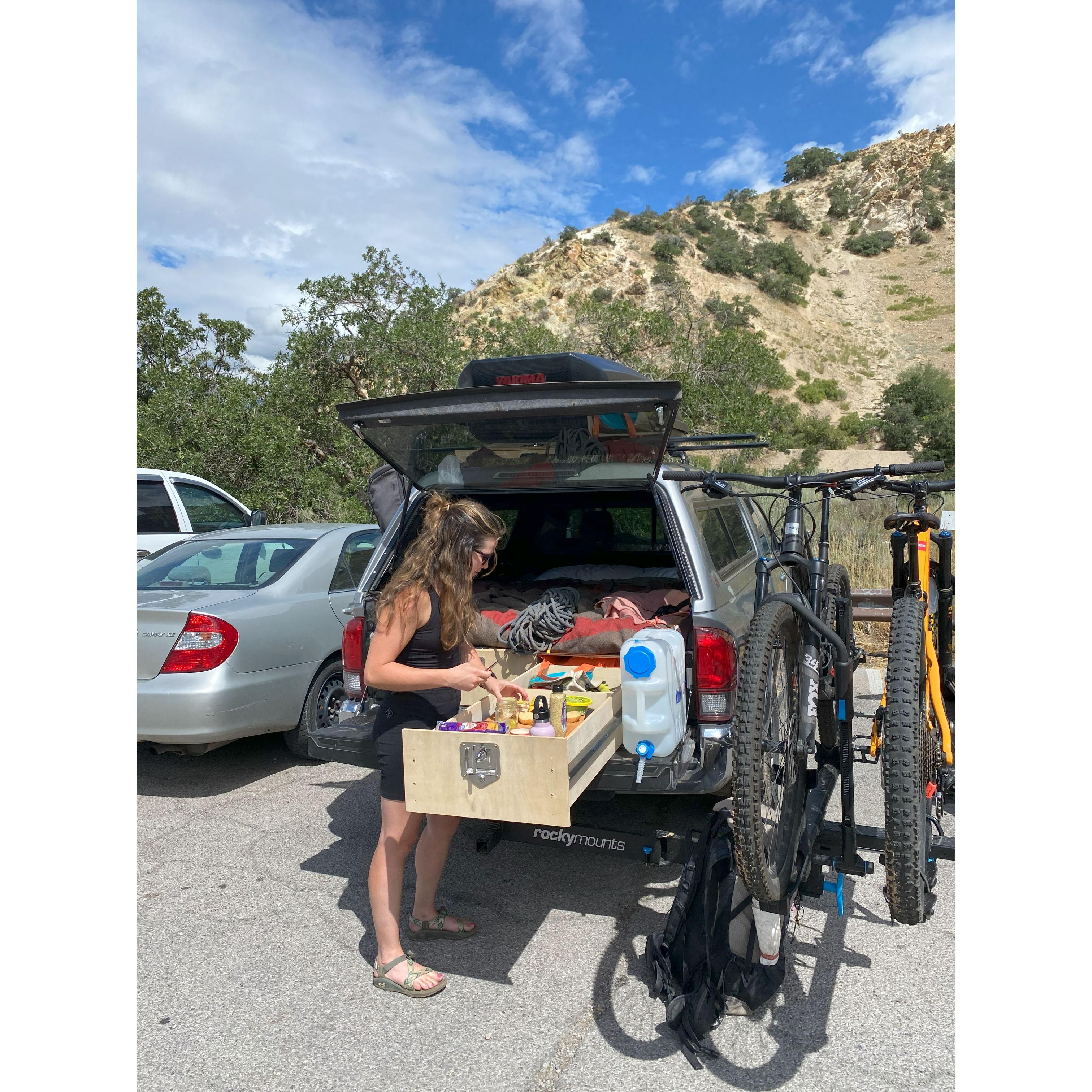 Tessa running the sando station on our climbing / mountain biking road trip last summer.