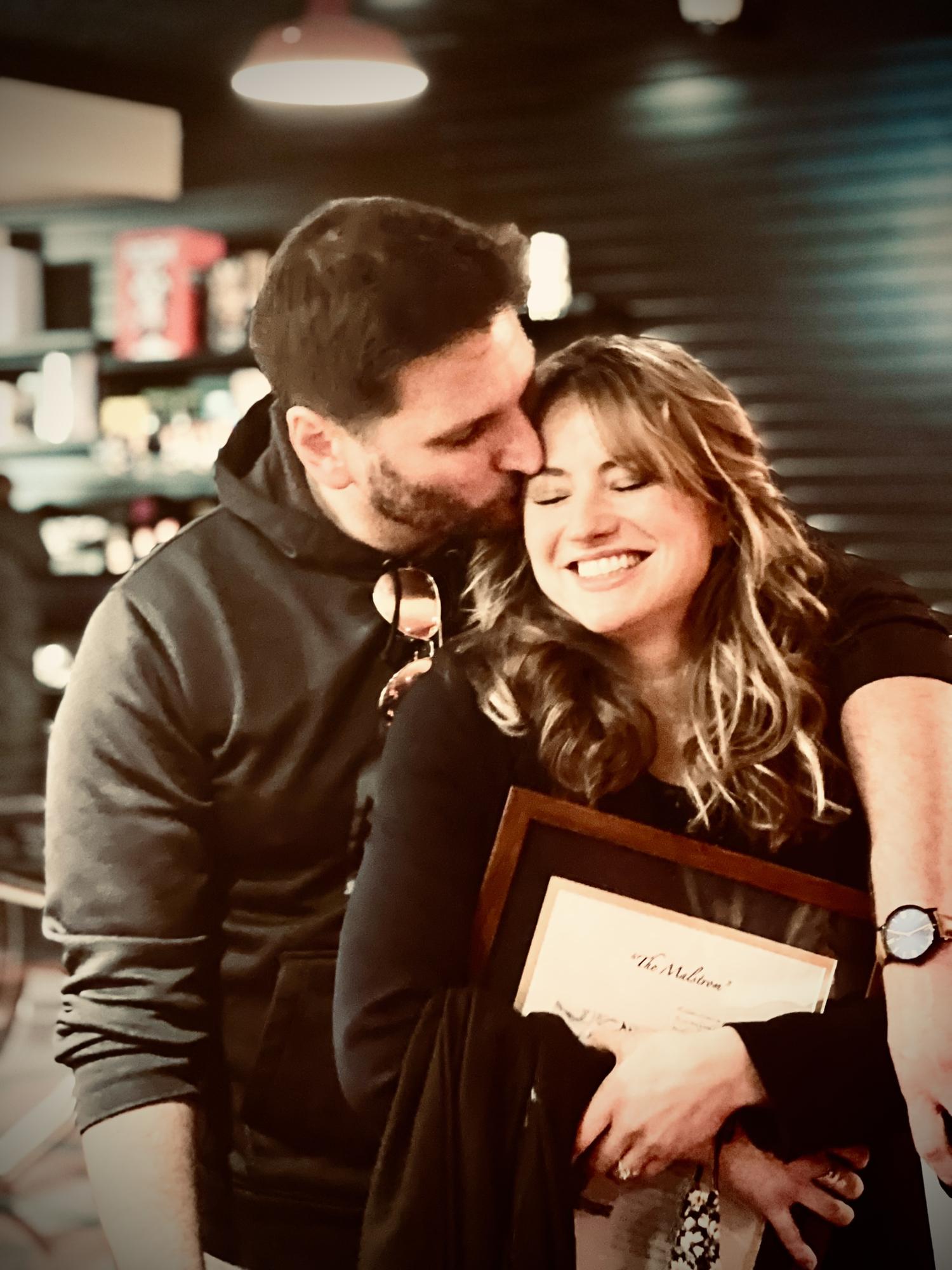 Mal's joyful surprise, giddiness, and relief immediately after Adam proposed