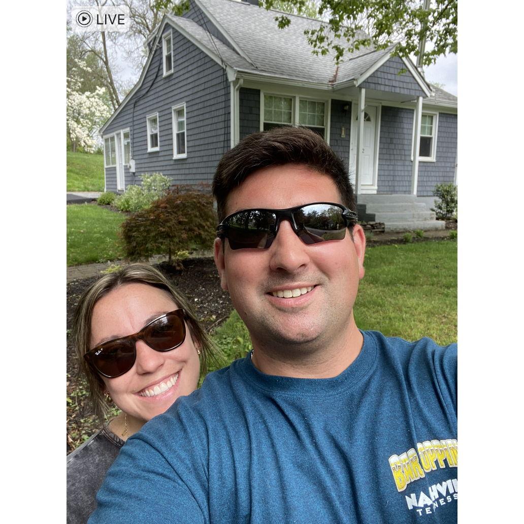 Our last photo in front of the first home we shared together - May 2022