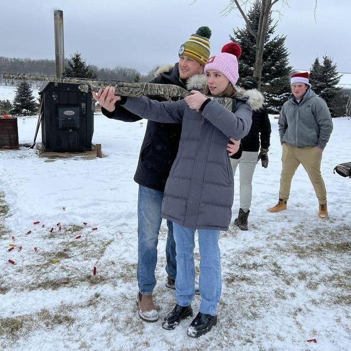 Grace shooting her first gun at Cole's cousin's Portage home (you can tell she really enjoyed it). January 2023.