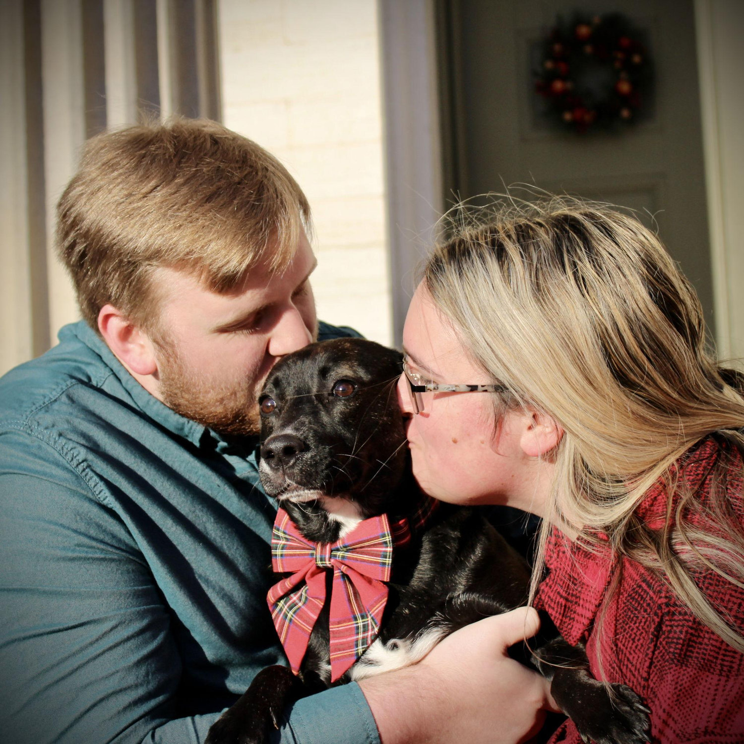 Our first Christmas with TT involved pictures! She is our world.