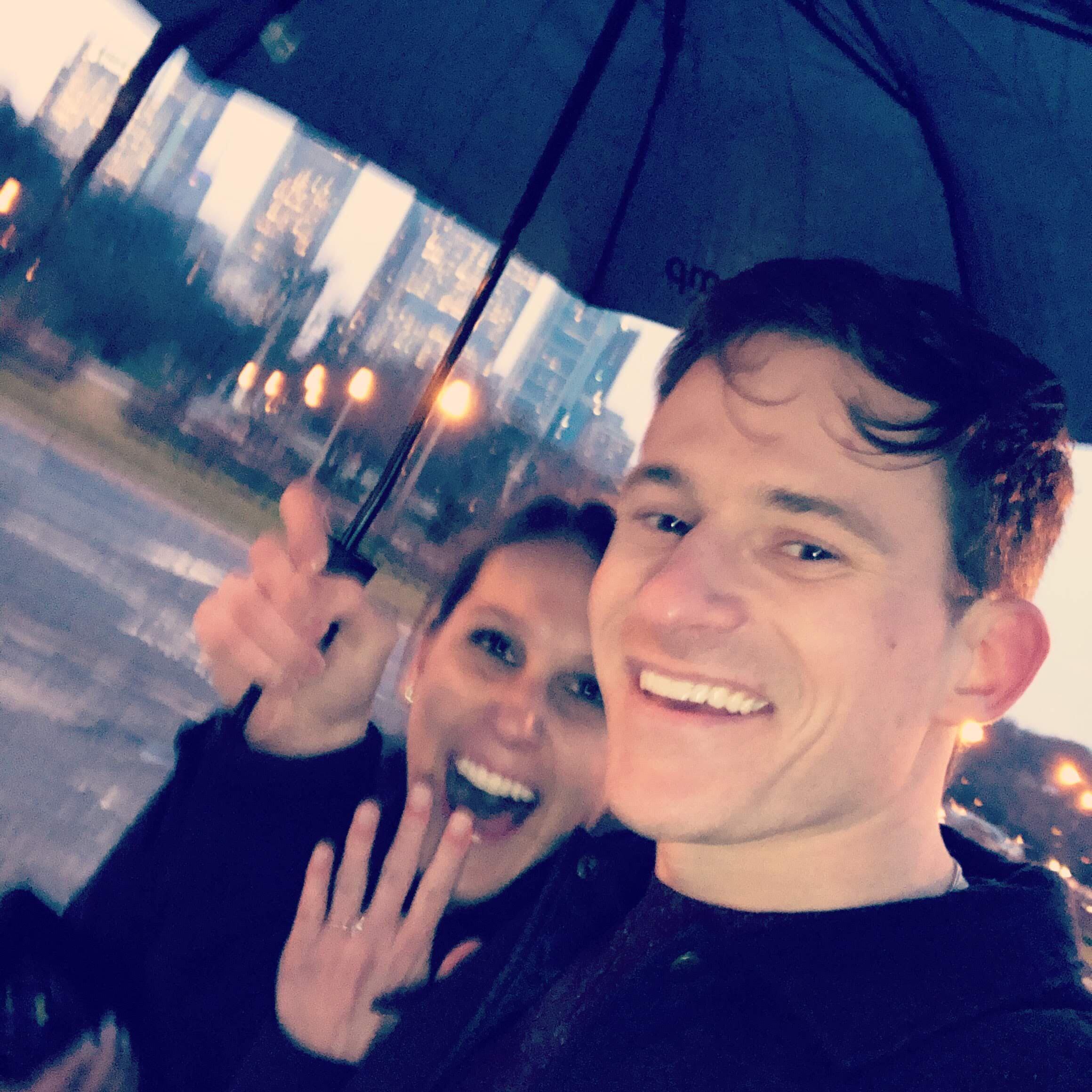 Perfect proposal at Buckingham Fountain in the rain