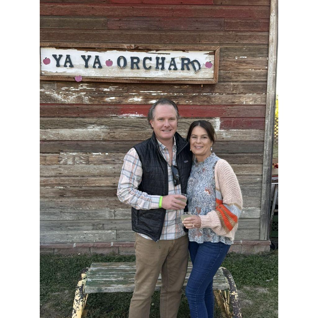Farm to table dinner in Longmont, CO. at a table outside in the orchard. Kim's bucket list item.