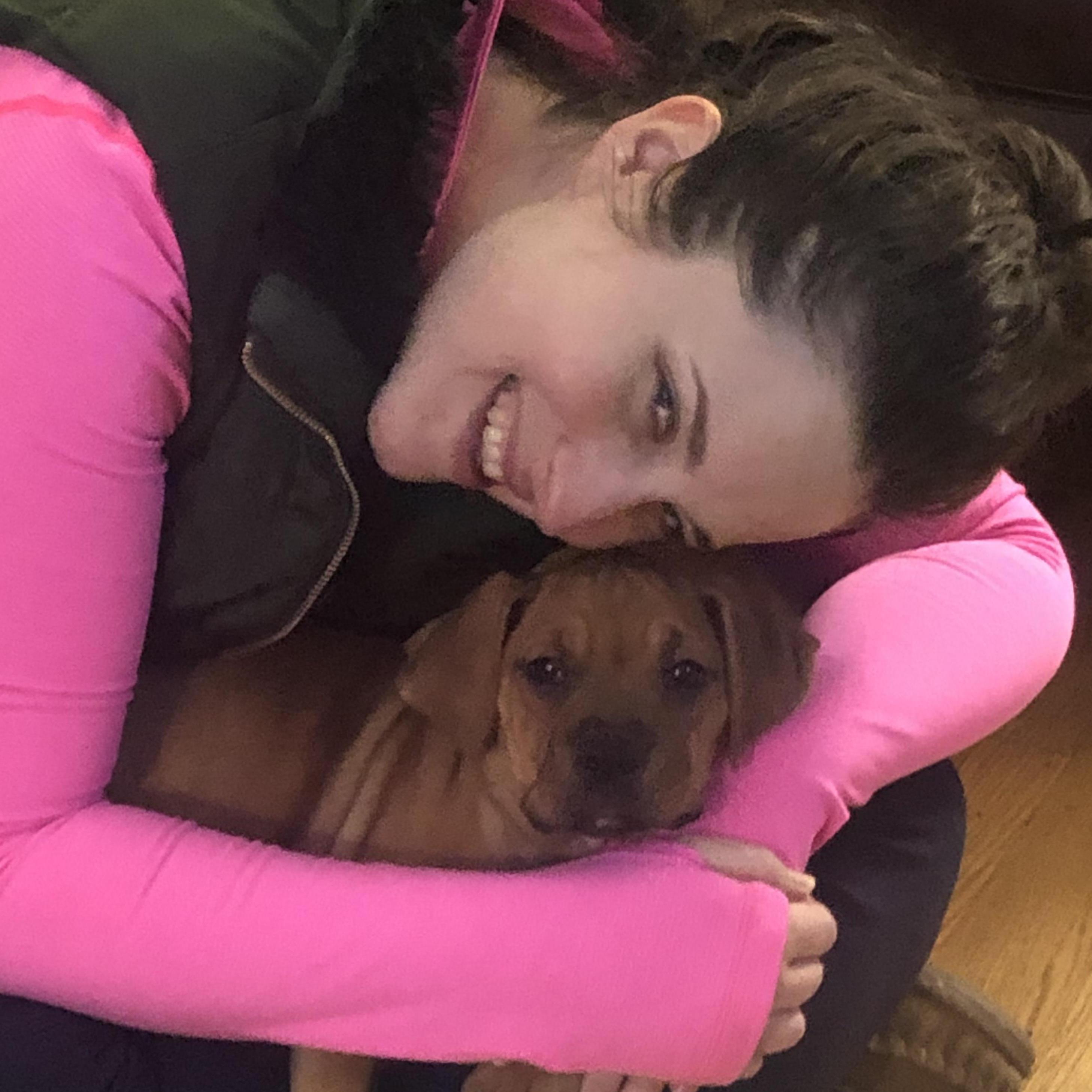 Kelsey with their new puppy, Pippa, February 2021
