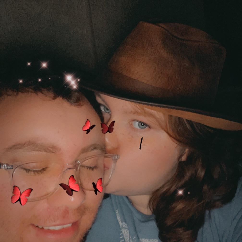 stealing his hat and trying to be cutesy