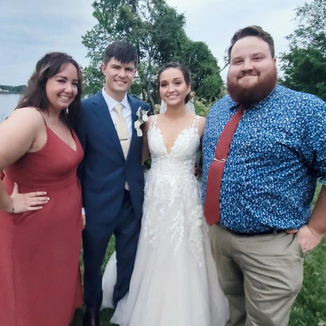 Sam and I with one of my bridesmaids and her hubby on their wedding day back in September 2022.