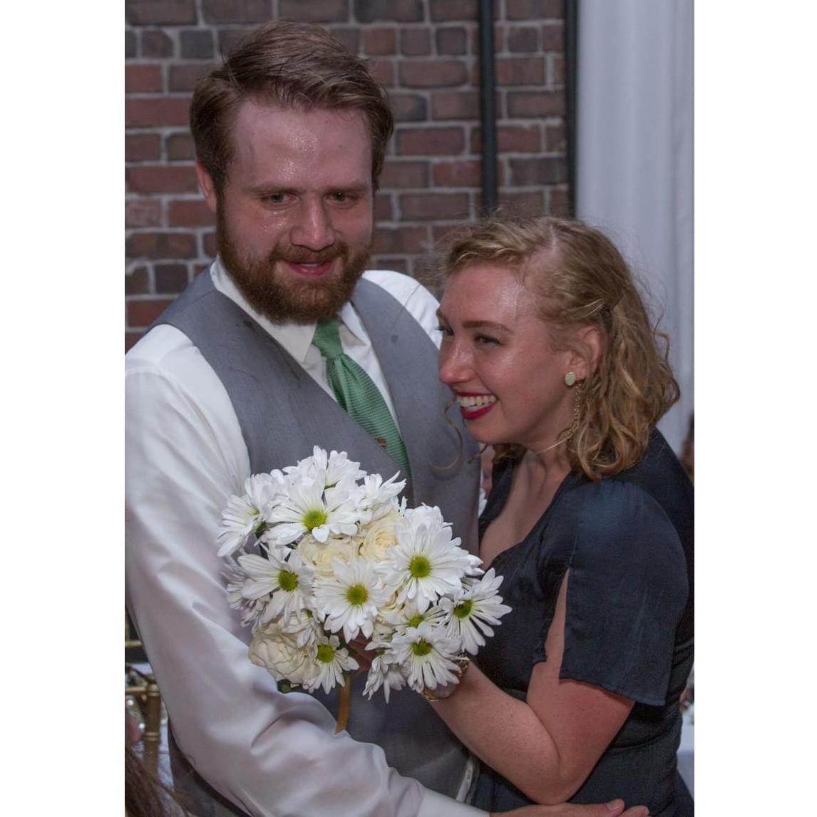 Nick & Emily's wedding, featuring one caught bridal bouquet.