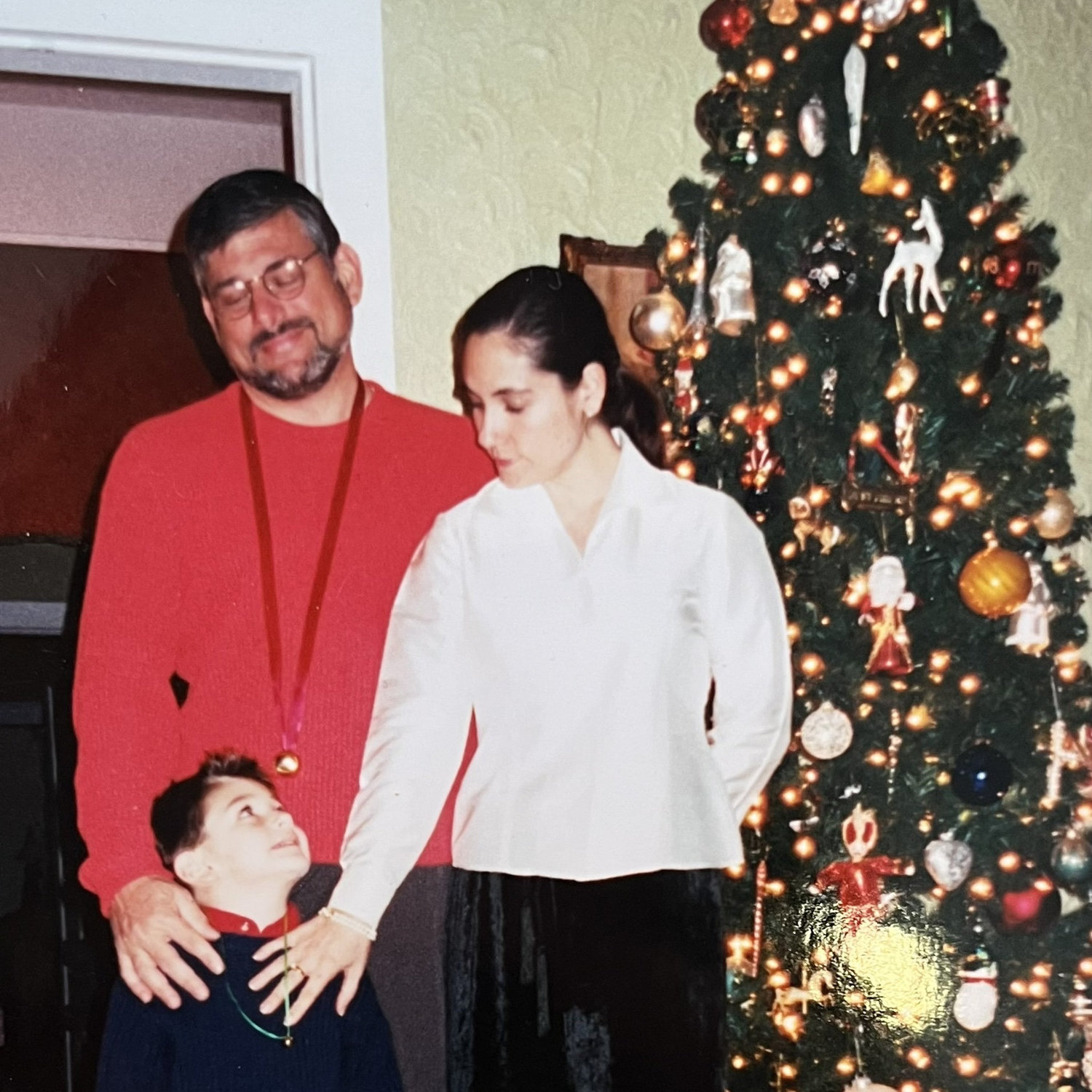 Robbie and his parents, Marion and Donna, in 2001.