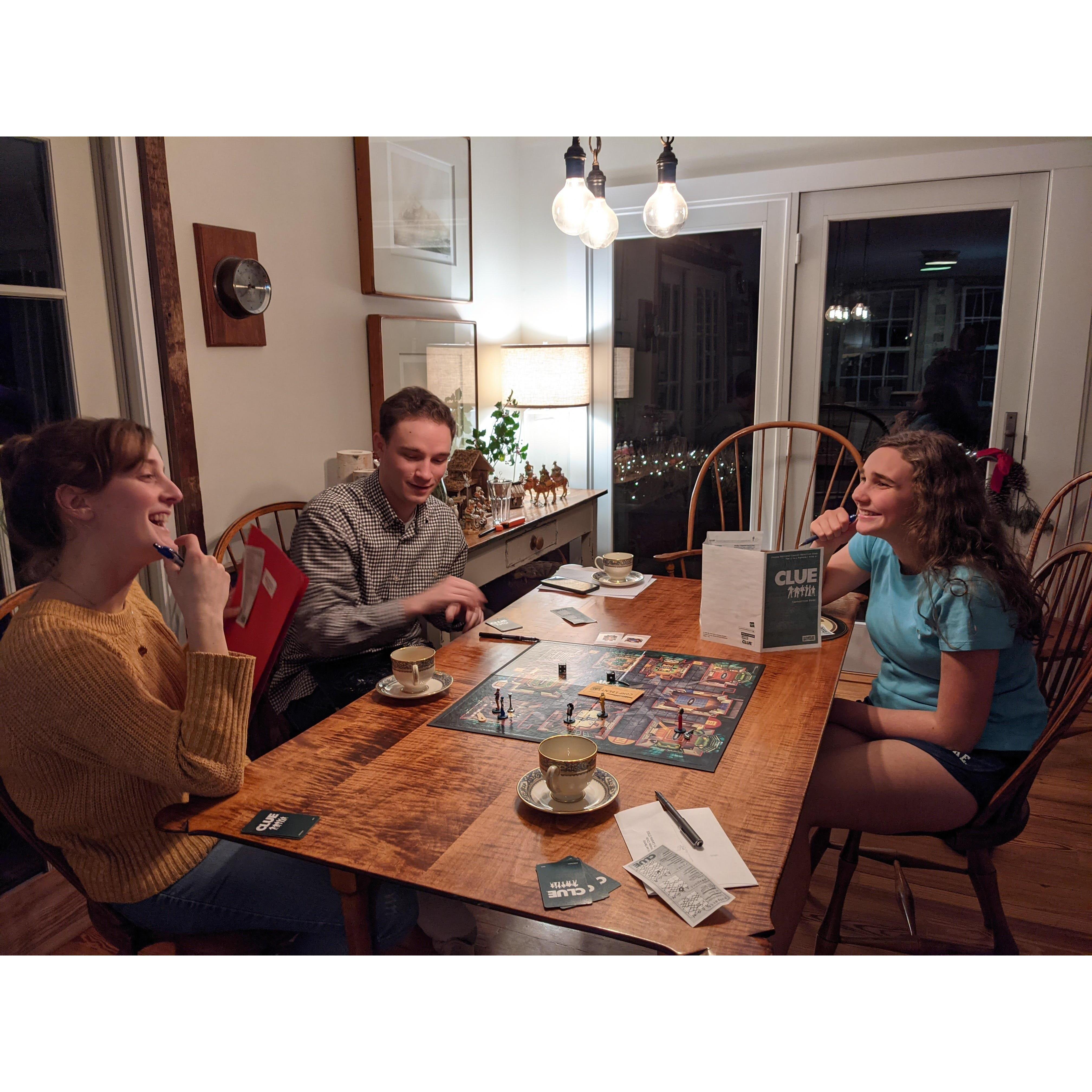 Sipping tea, laughing, and playing fiercely competitive boardgames? You would be hard pressed to pick a more quintessential photo!