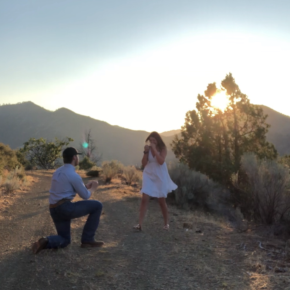 July 24, 2020. Trevor was so calm all day and never let on to anything, I had no idea! After the sun went down we went back to my house where both of our parents had cake and champagne to celebrate.