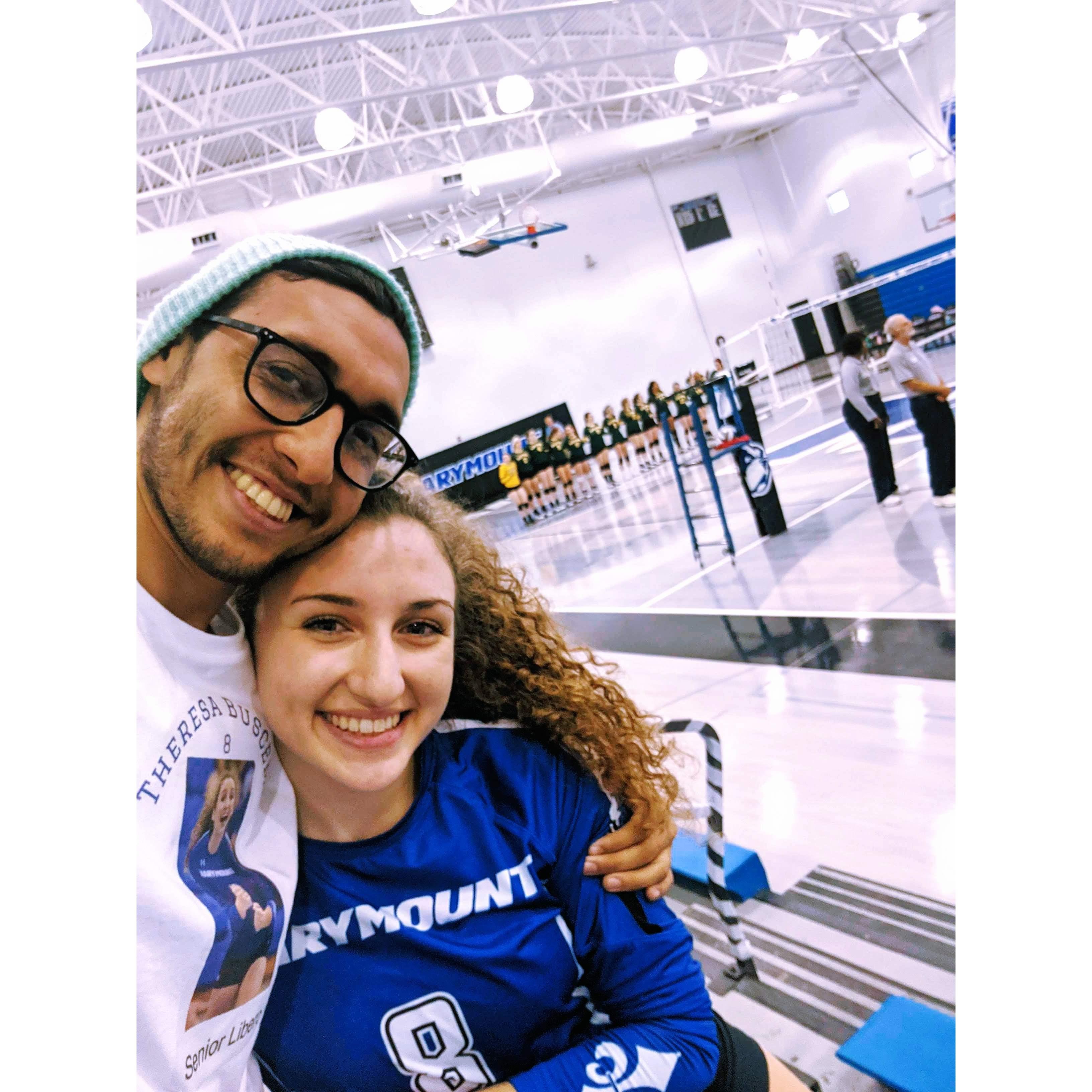 Johnny supporting Theresa in her last college volleyball game.