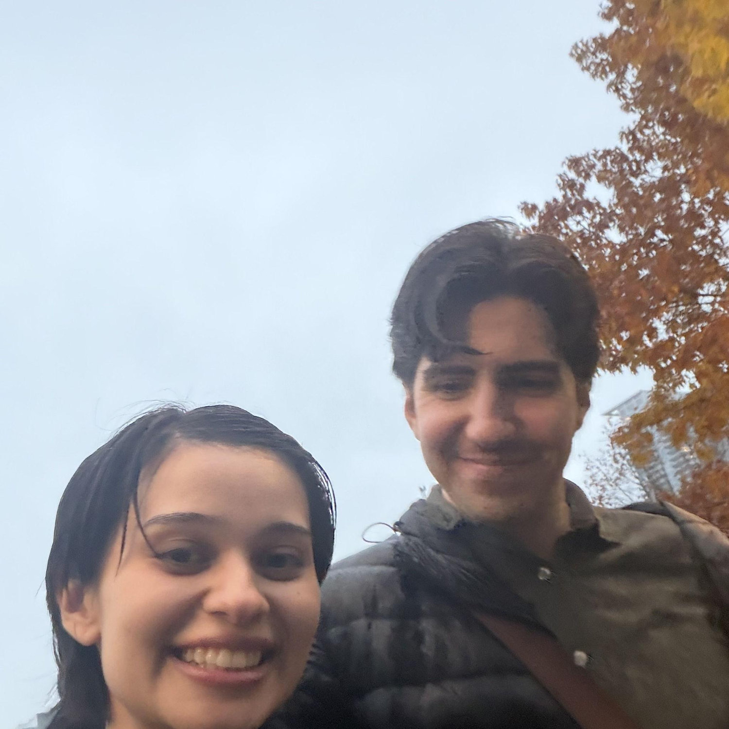 A recent photo, us in the heavy rain in Seattle :,)