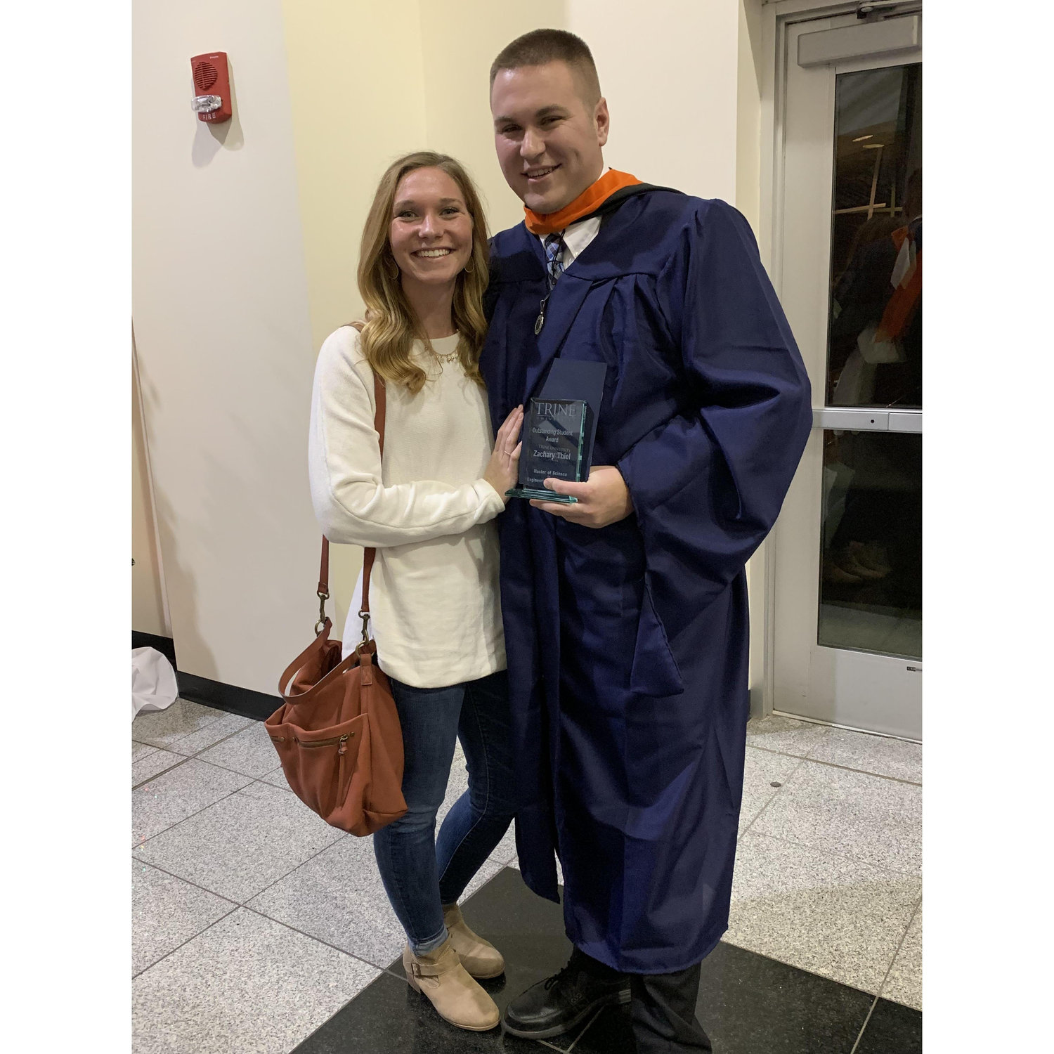 Zac's hooding ceremony for his Masters