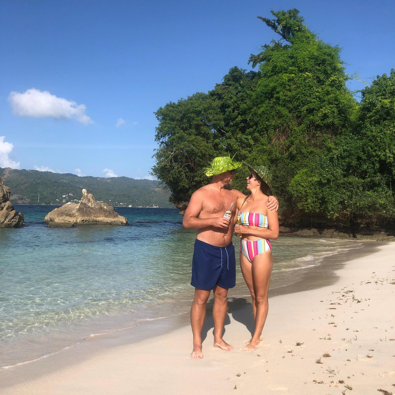 They both have a love for the beach and they try to go as often as possible. However, they enjoy beach time differently: Kendall loves activities and Aaron enjoys sitting with a podcast and a beer.