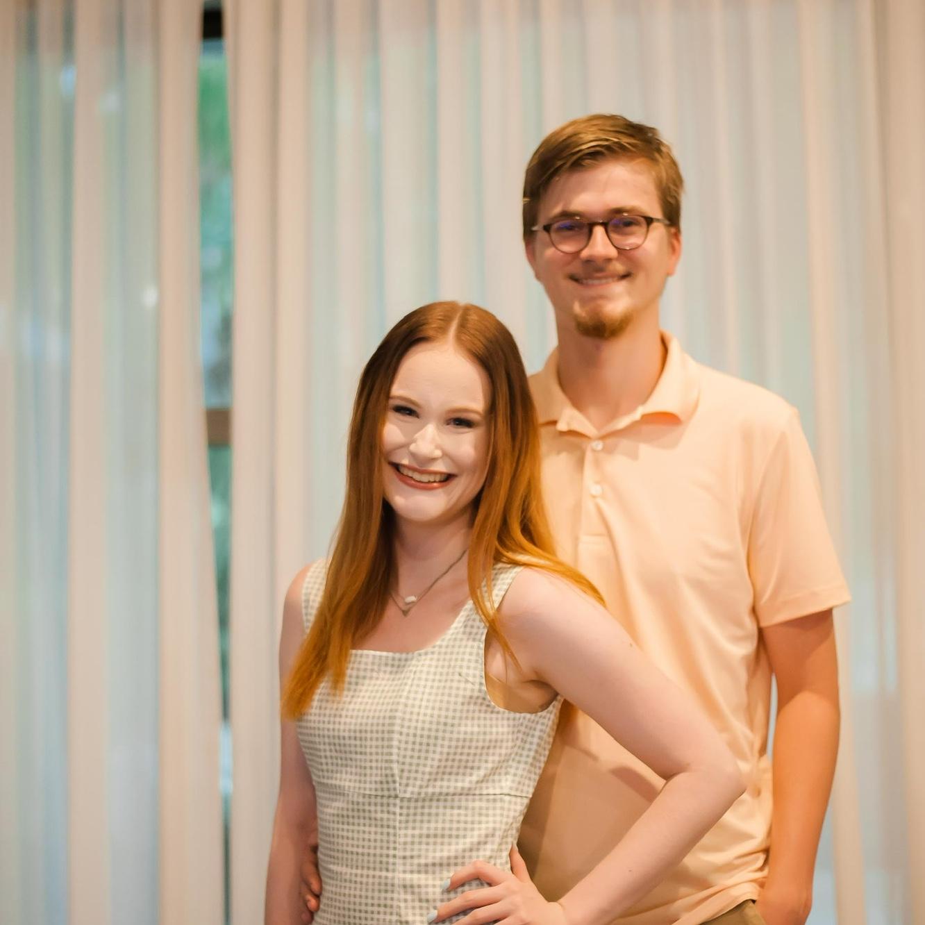 Ashley's family hired a professional photographer for family photos on vacation and we snuck in one of us!