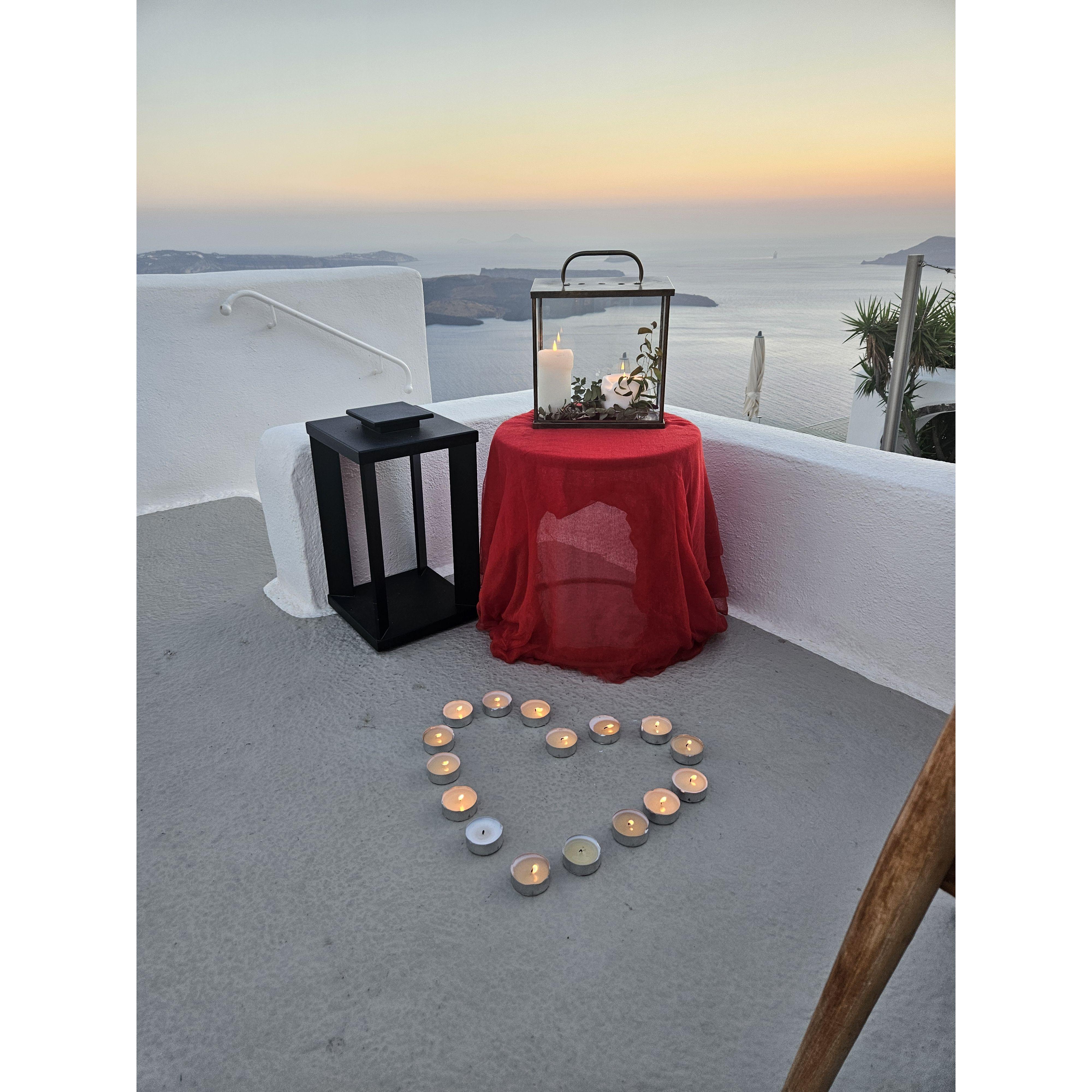The most beautiful backdrop when Elliot proposed during a private dinner at the hotel in Santorini (a few candles were no match for the island winds!).