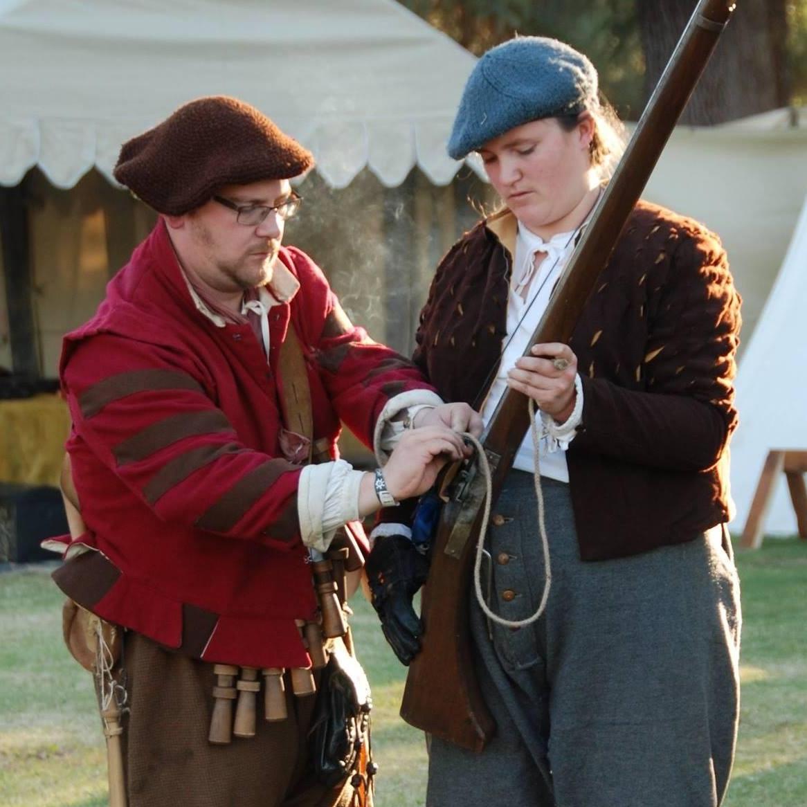 Peter teaches me to shoot at Kearney Park Ren Faire.