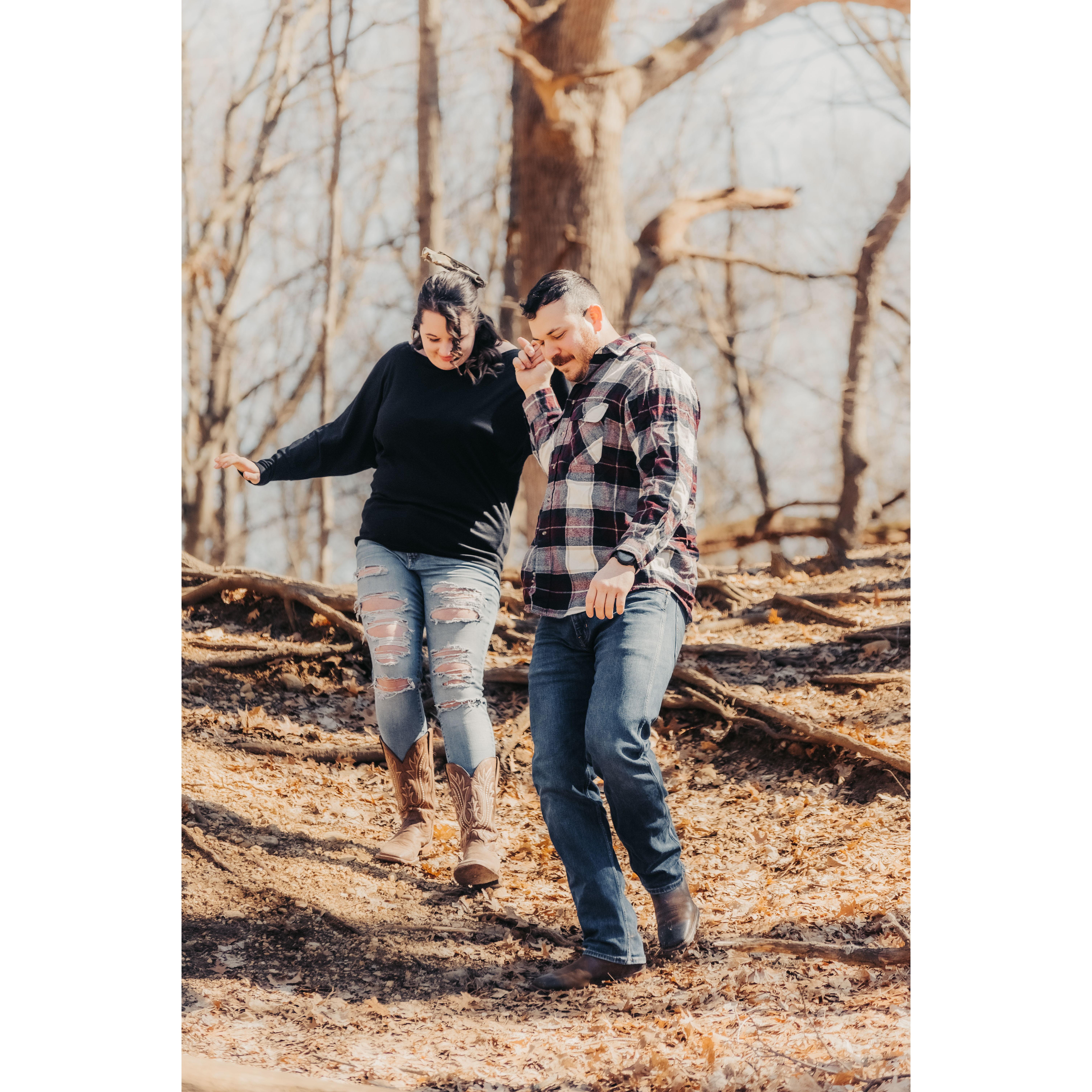 This was during our engagement photo shoot. We had to climb up a hill to a higher point to get a specific angle and after almost tripping own the hill Dustin held my hand the rest of the way down to make sure I didn't fall.