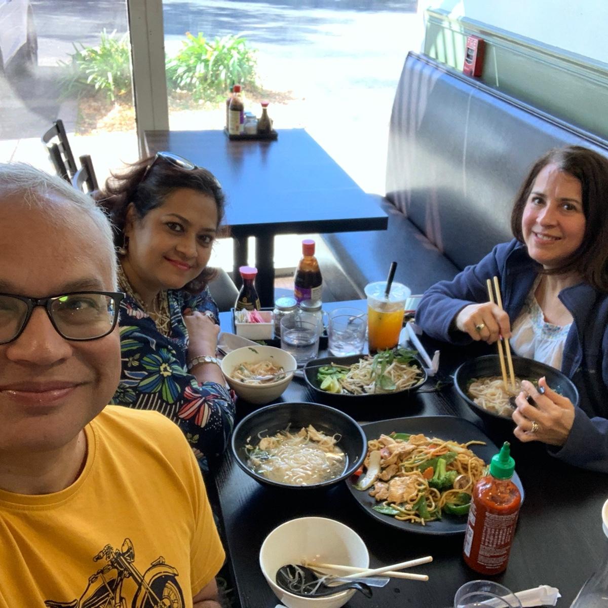 The parents eating pho at Ha Long Bay.