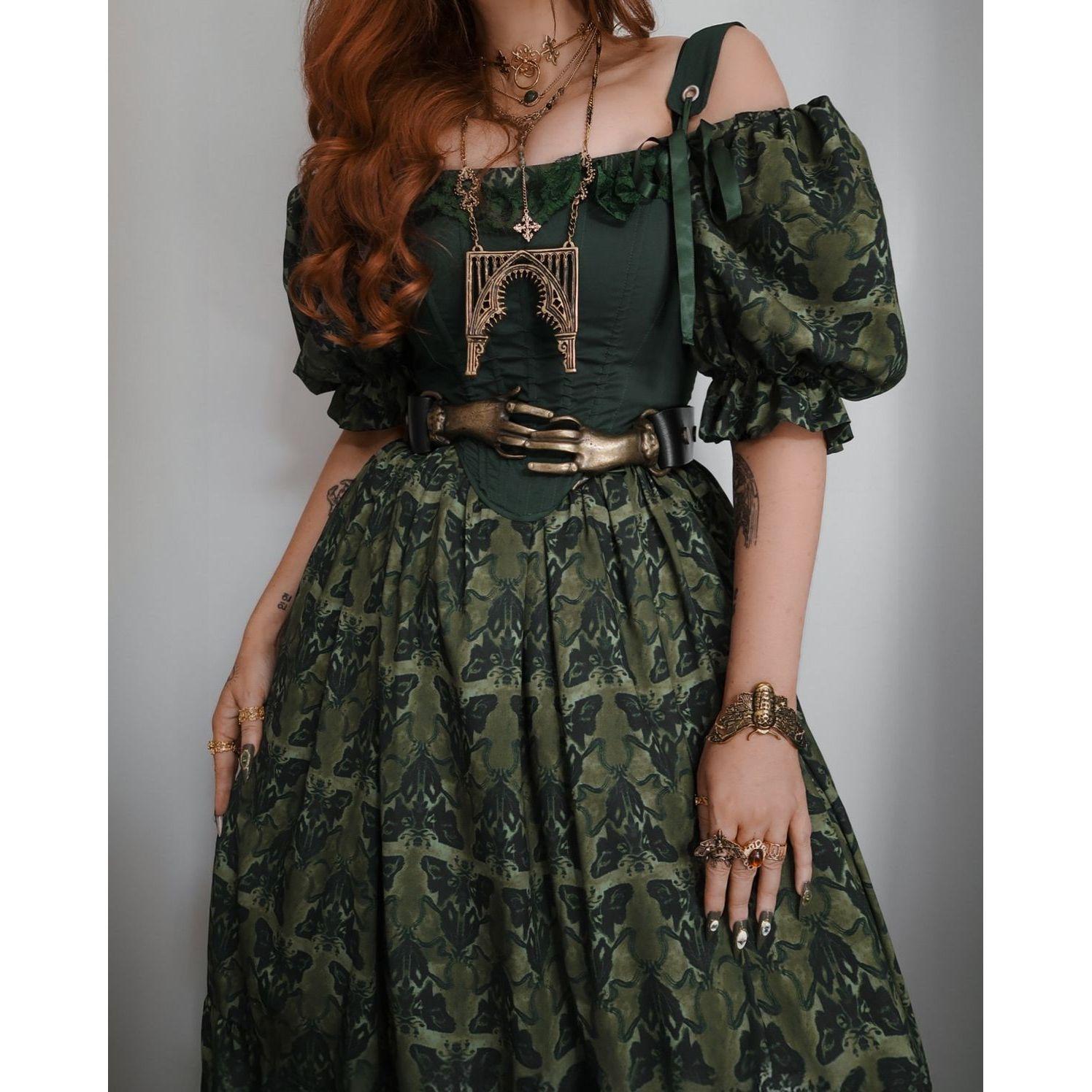 The dress is cute, and the corset and accessories give it that ren look.