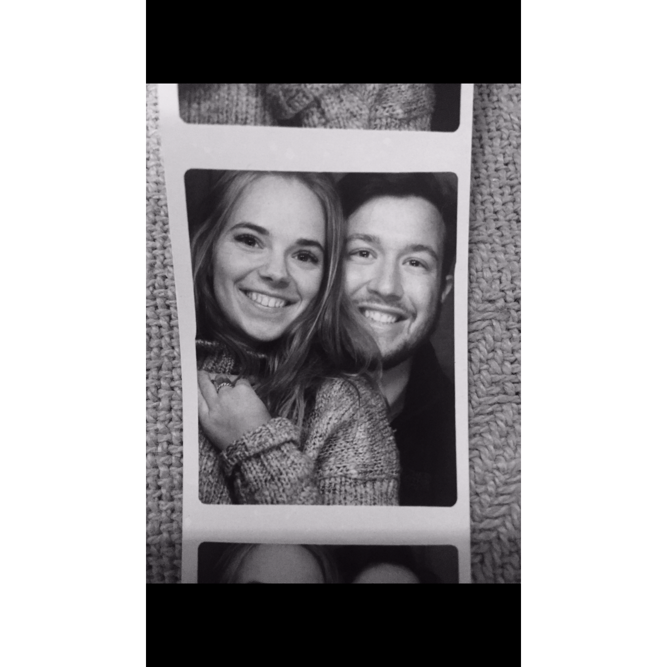 Taking a picture in the photobooth before heading off to the movies.