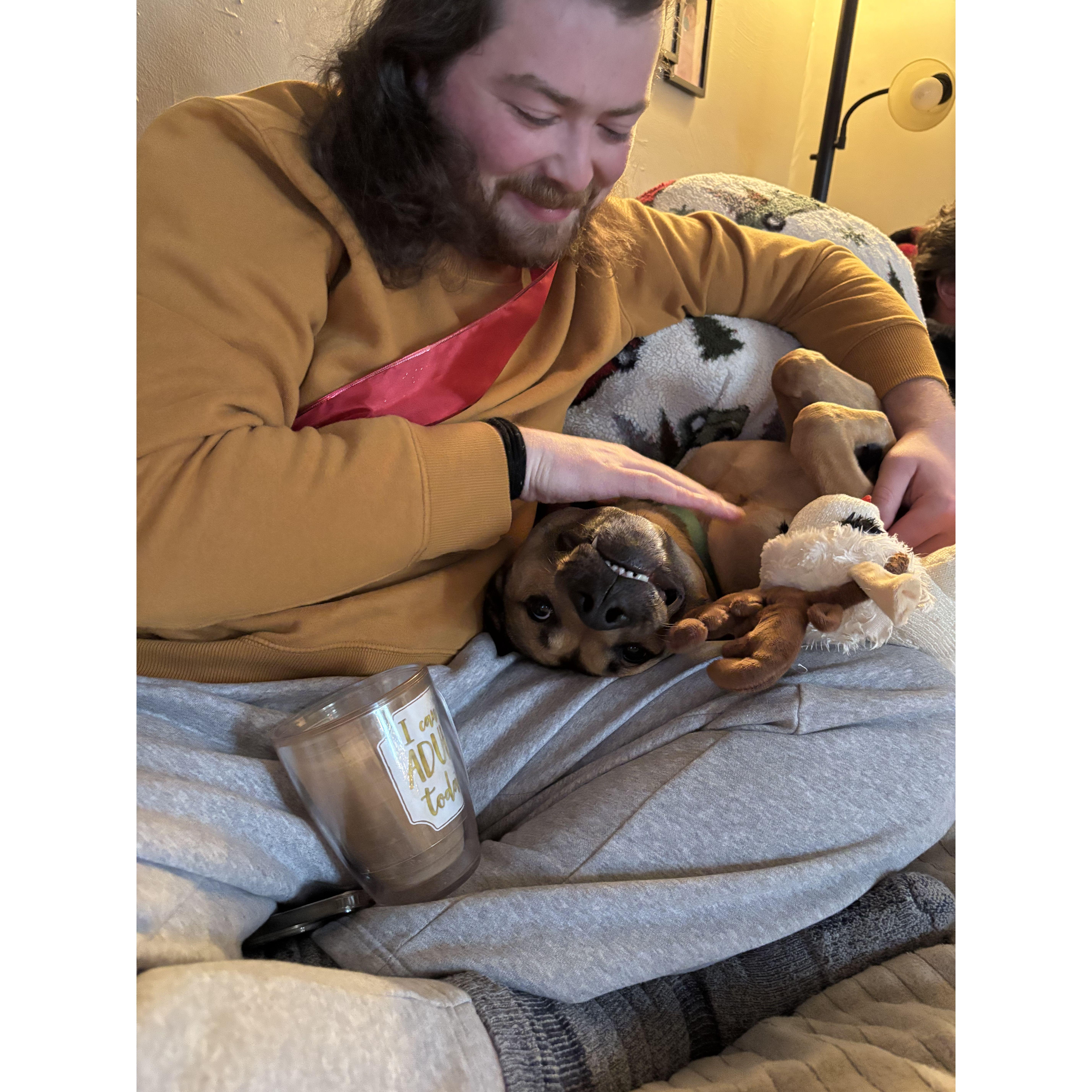 12.25.24 - Matt snuggles with Bear on Christmas Day at the Webster's