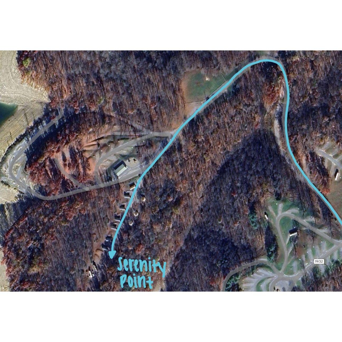 After taking those two rights. Go down and up the hill. Follow the left turn, pass the bathrooms and “Cozy Cabins” & “Yurts.” Staff will instruct you where to park.