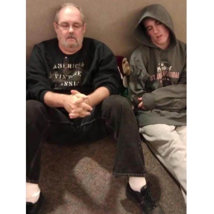 Mark and his grandpa, Mike, catching some Zs (2012)