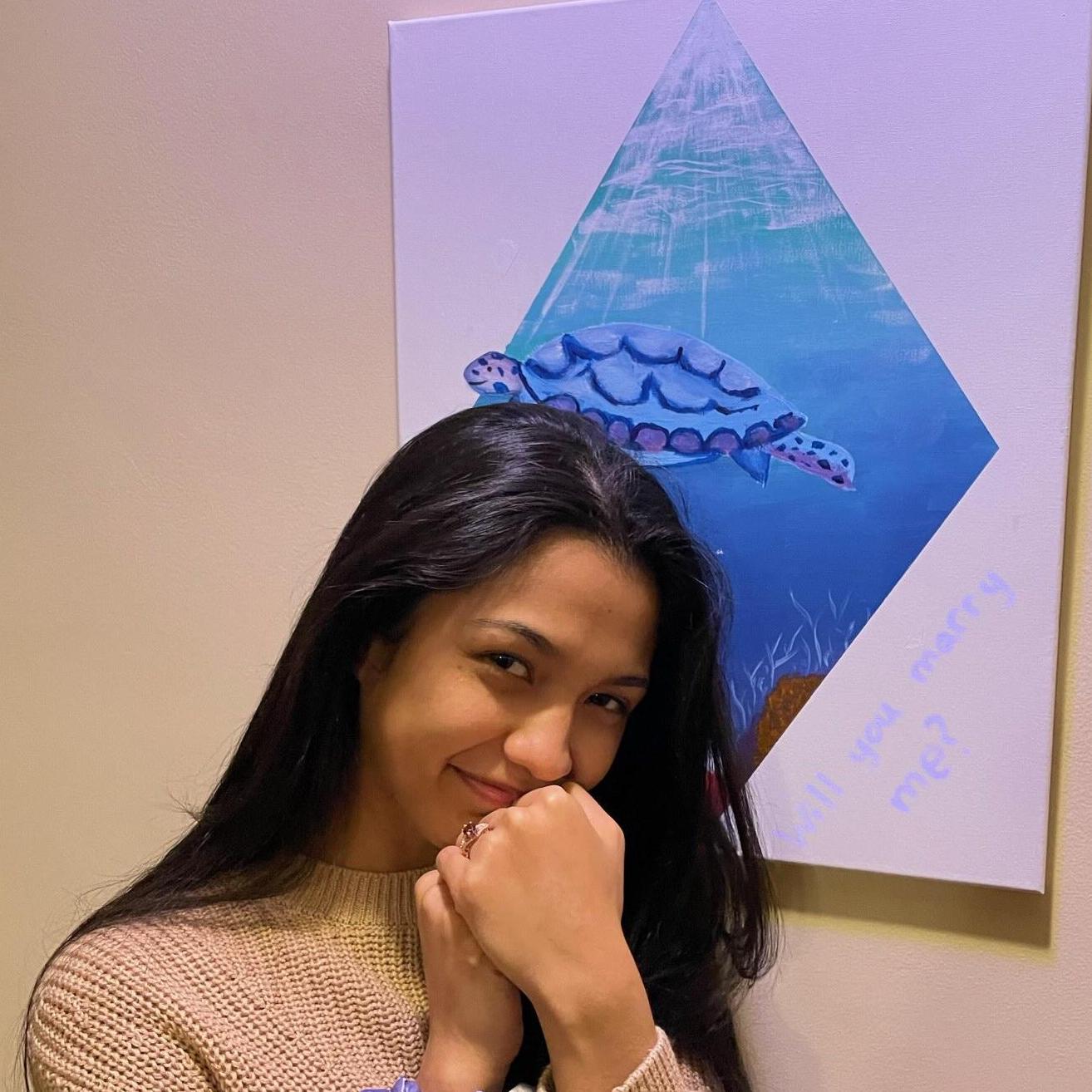 Ariel with the picture I painted for the proposal